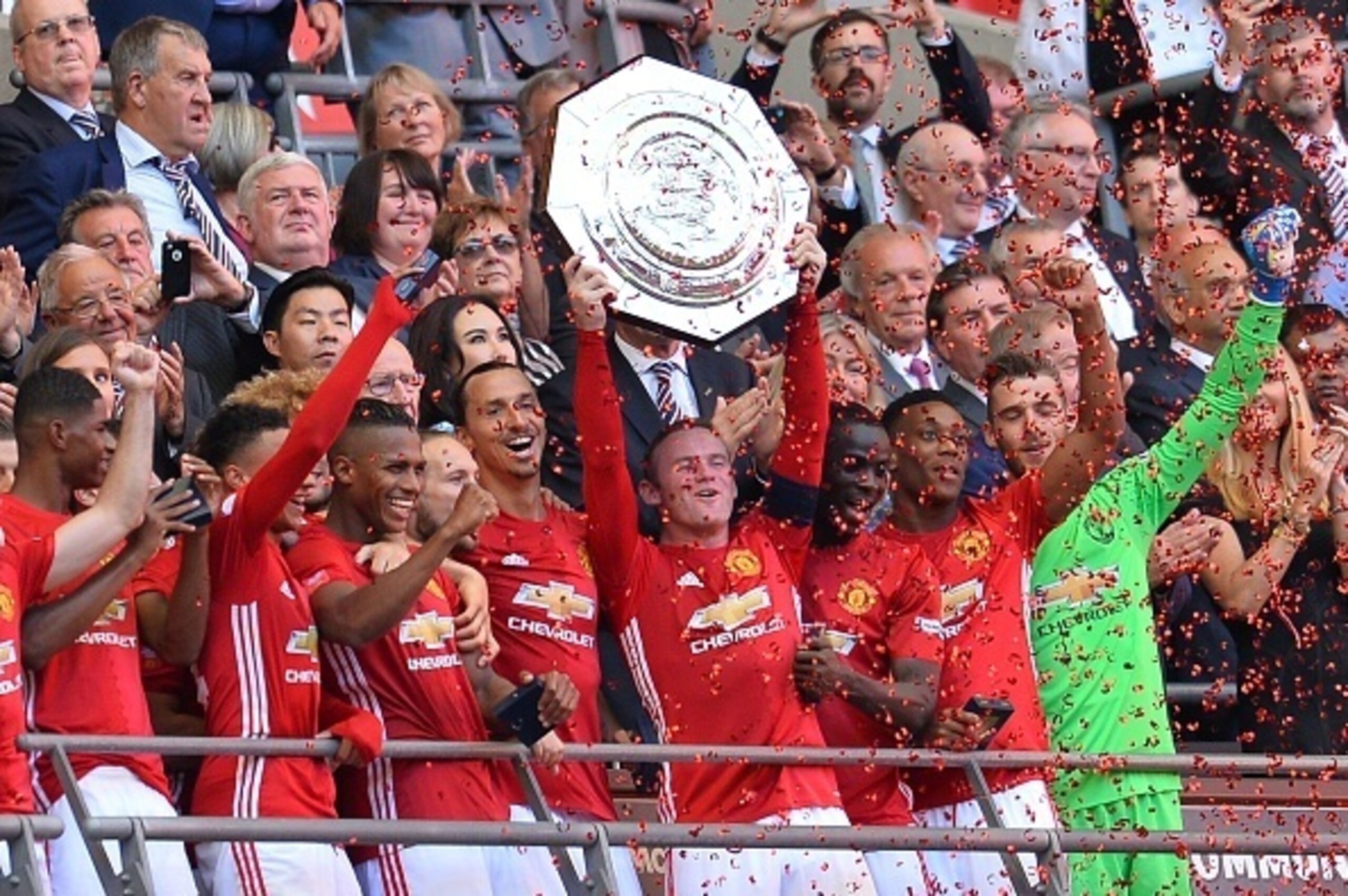 Rooney lifts the Community Shield at Wembley.