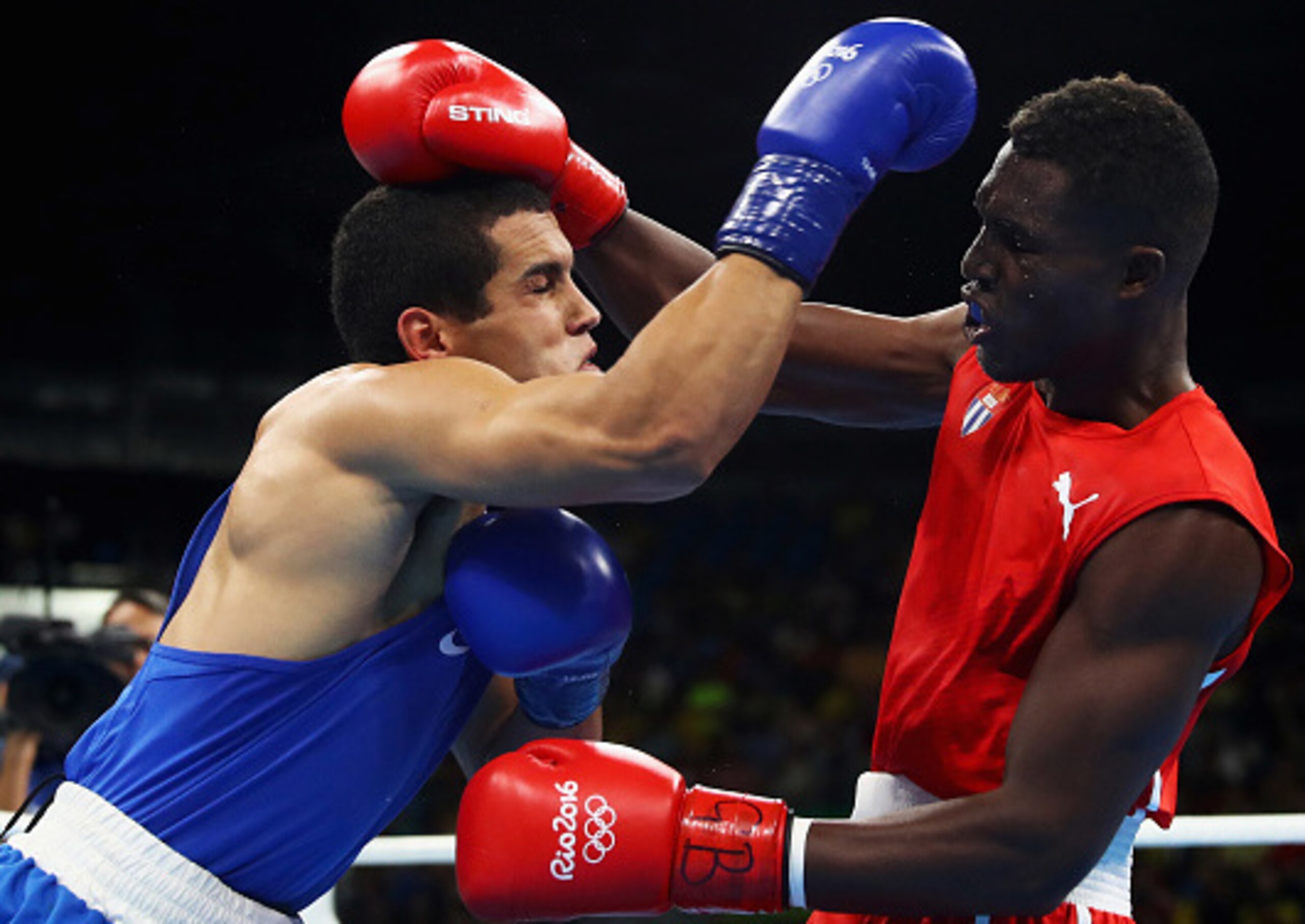 France's Mathieu Bauderlique misses Cuba's Julio Cesar La Cruz in the semifinals. France's Mathieu Bauderlique misses Cuba's Julio Cesar La Cruz in the semifinals.