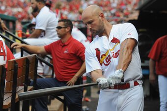 The injured Matt Holliday could collect his 2,000th career hit if he returns this season.