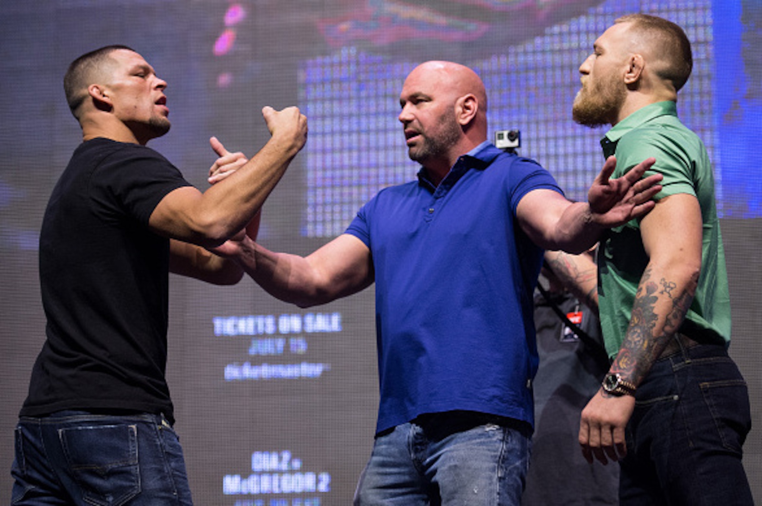 Nate Diaz, left, faces off with Conor McGregor at a promotional event.
