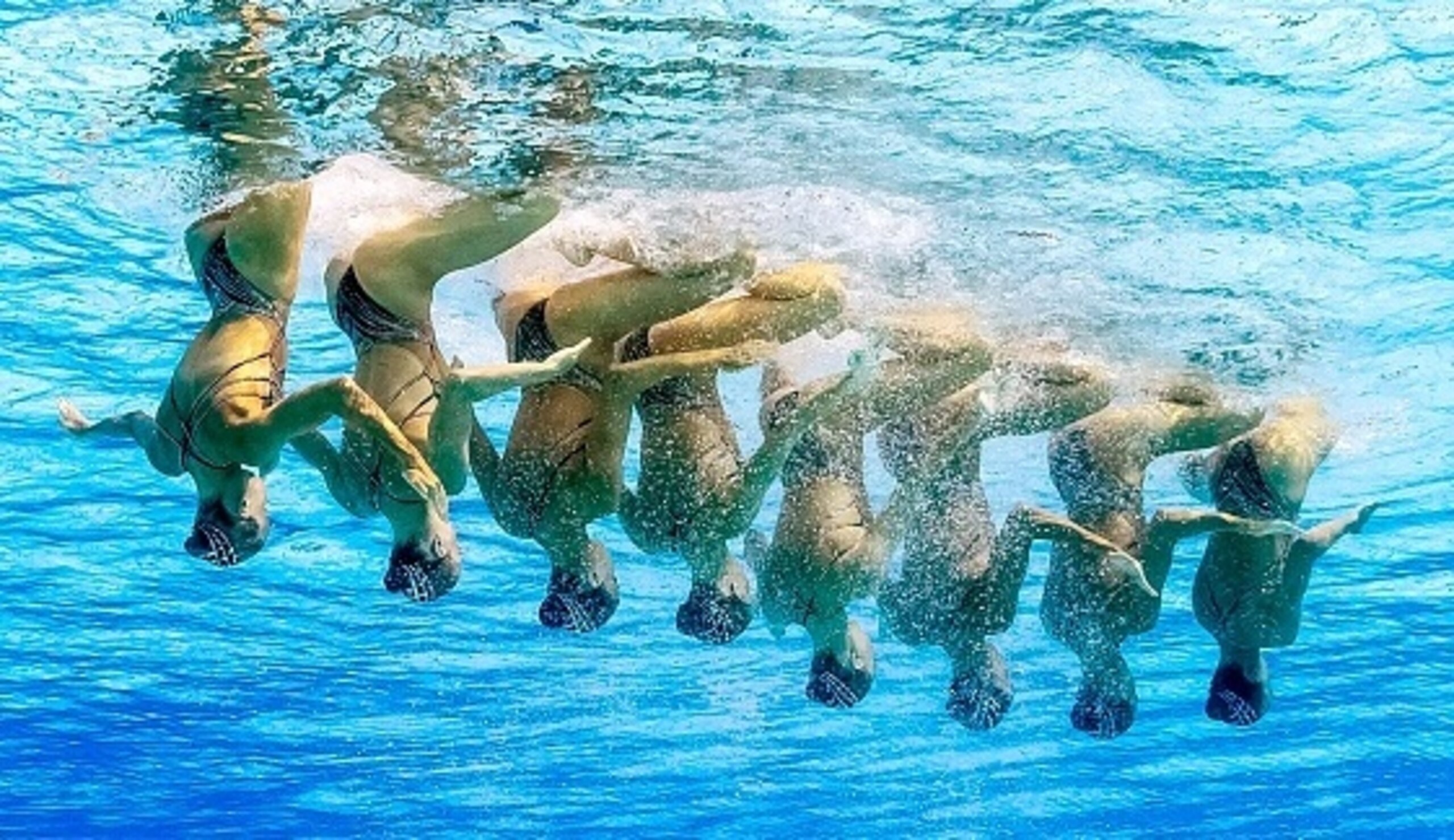 Russia's synchronized swimmers do things upside-down that most of us can't do the other way.