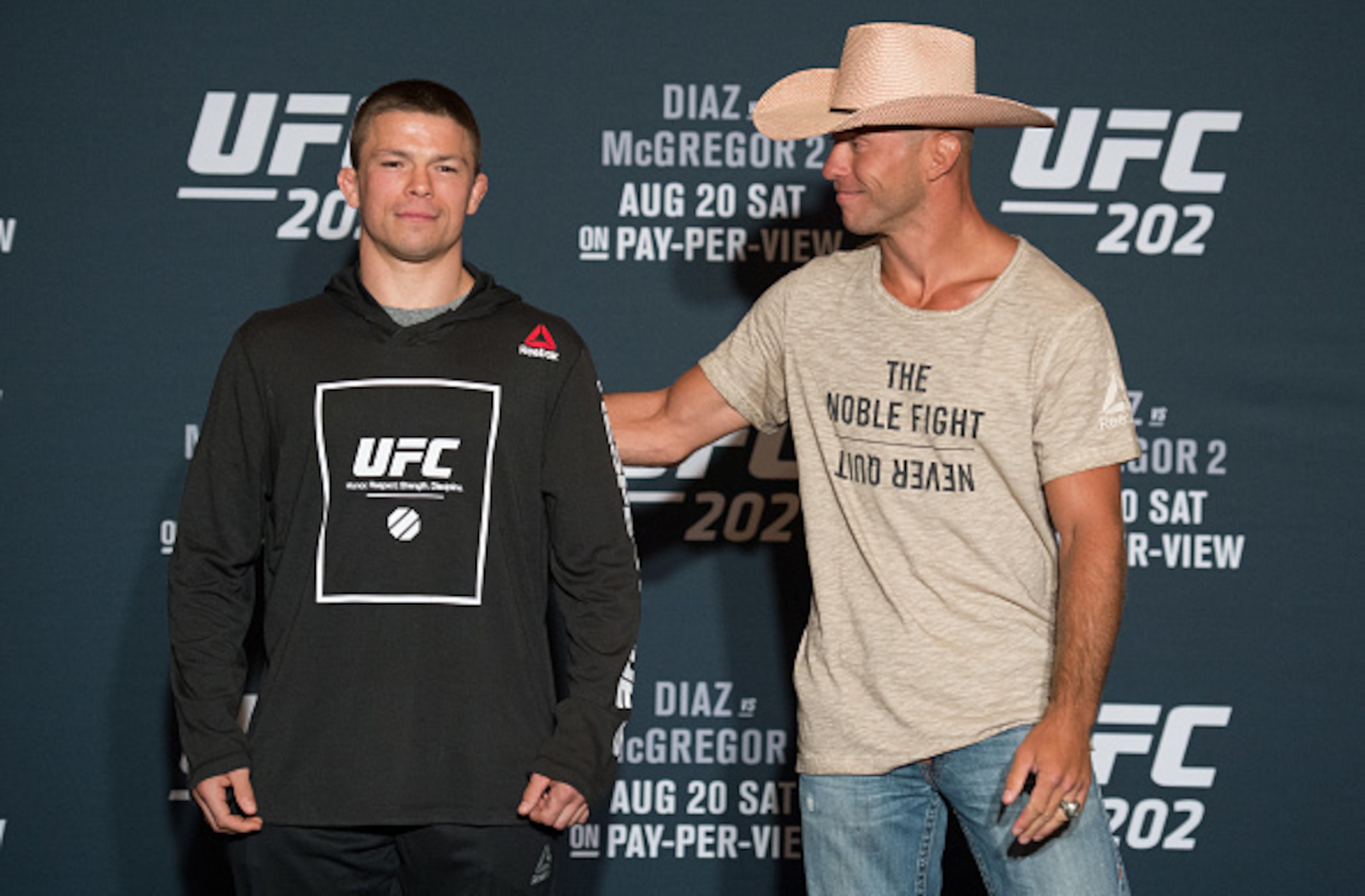Rick Story (left) and Donald Cerrone Rick Story (left) and Donald Cerrone