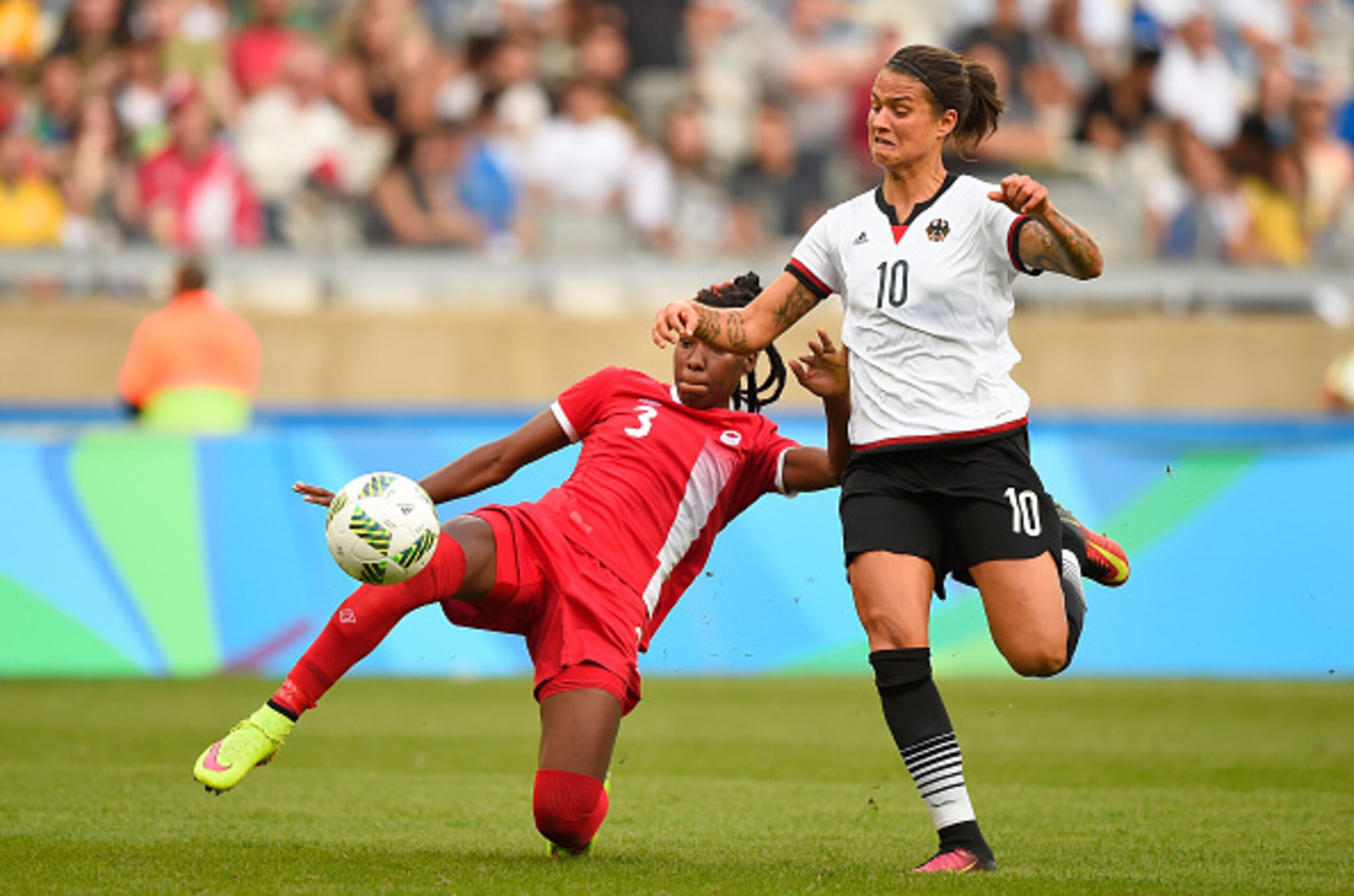 Buchanan tackles Marozsan.