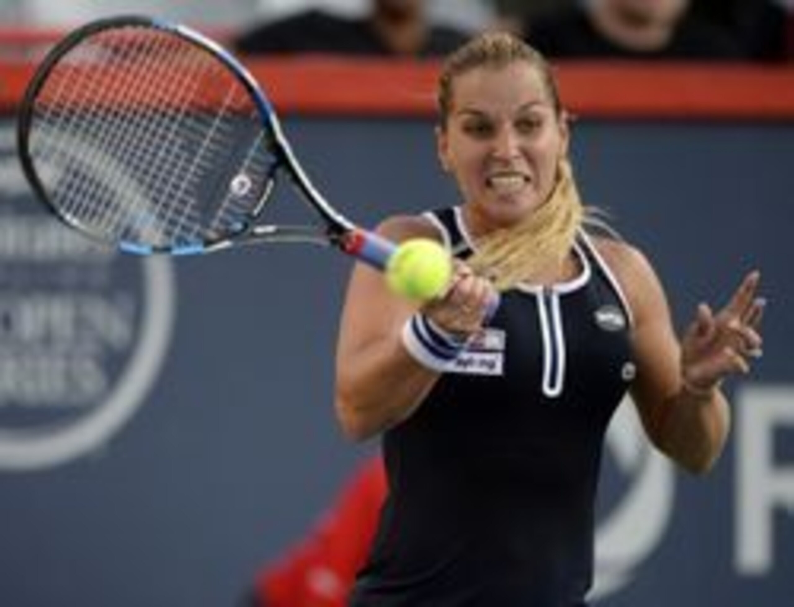 Dominika Cibulkova hits a forehand during a match at he 2016 Rogers Cup.