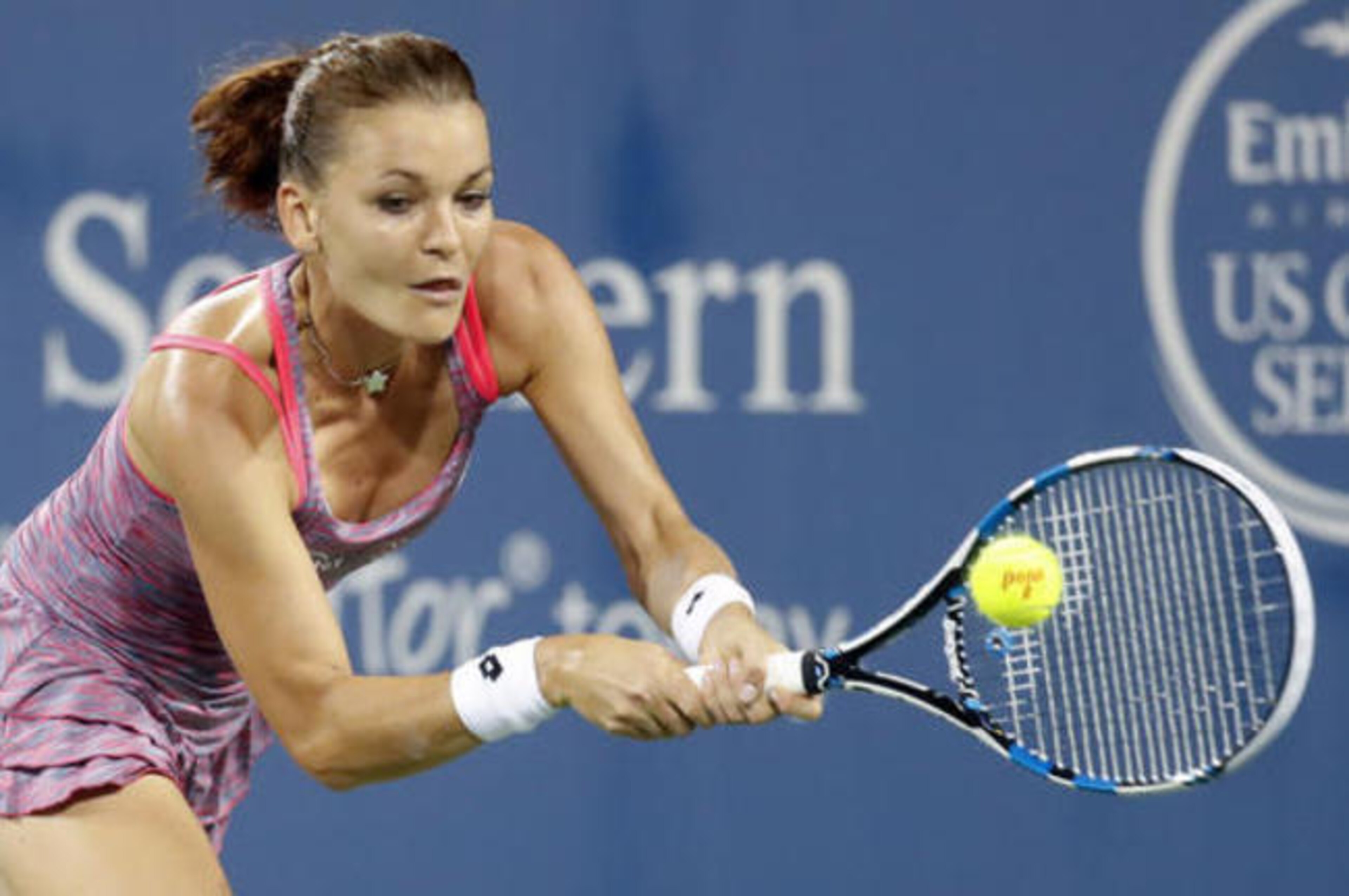 Agnieszka Radwanska hits a backhand during a match at the 2016 Western and Southern Open.