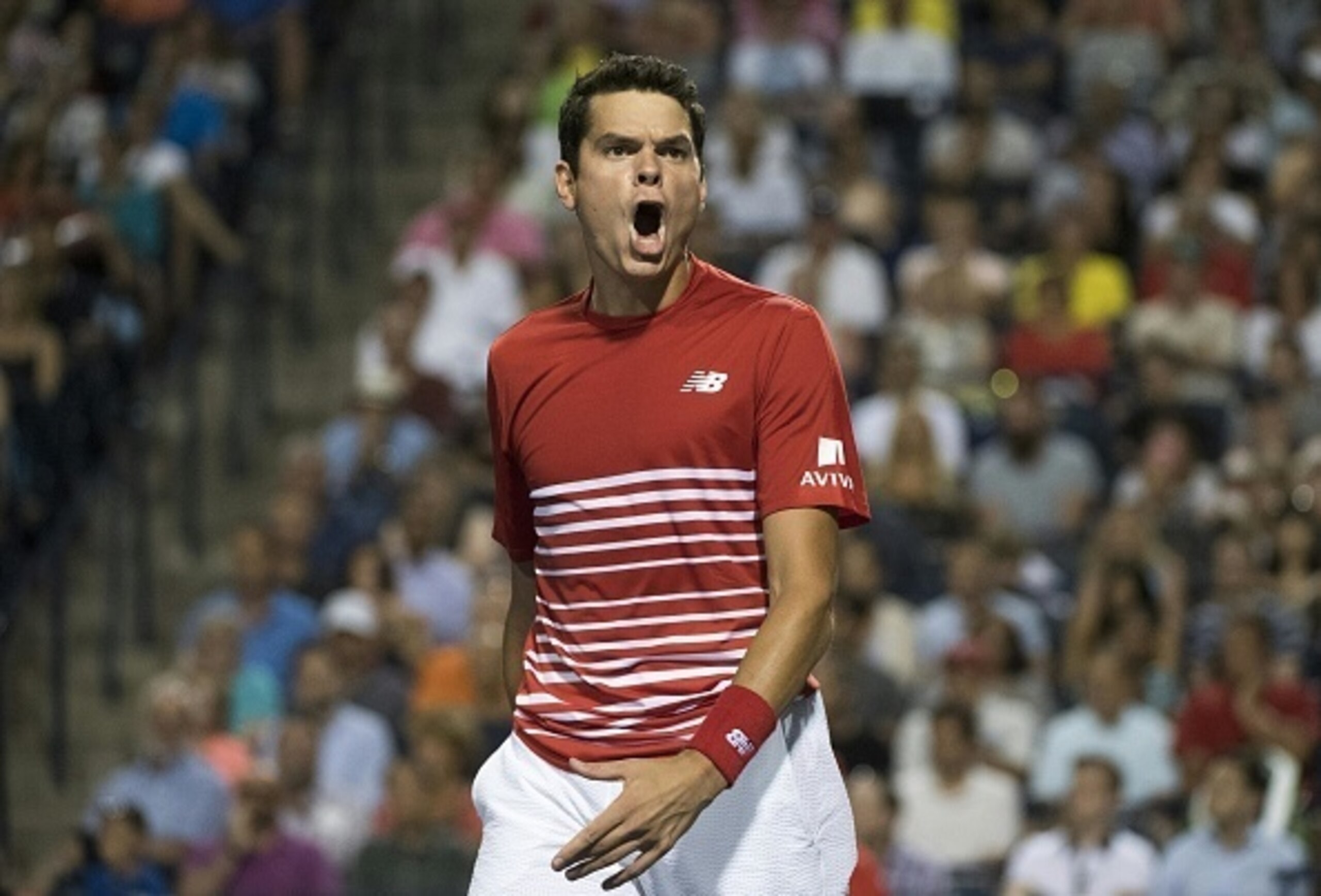 Raonic reacts to a point during the 2016 Rogers Cup.
