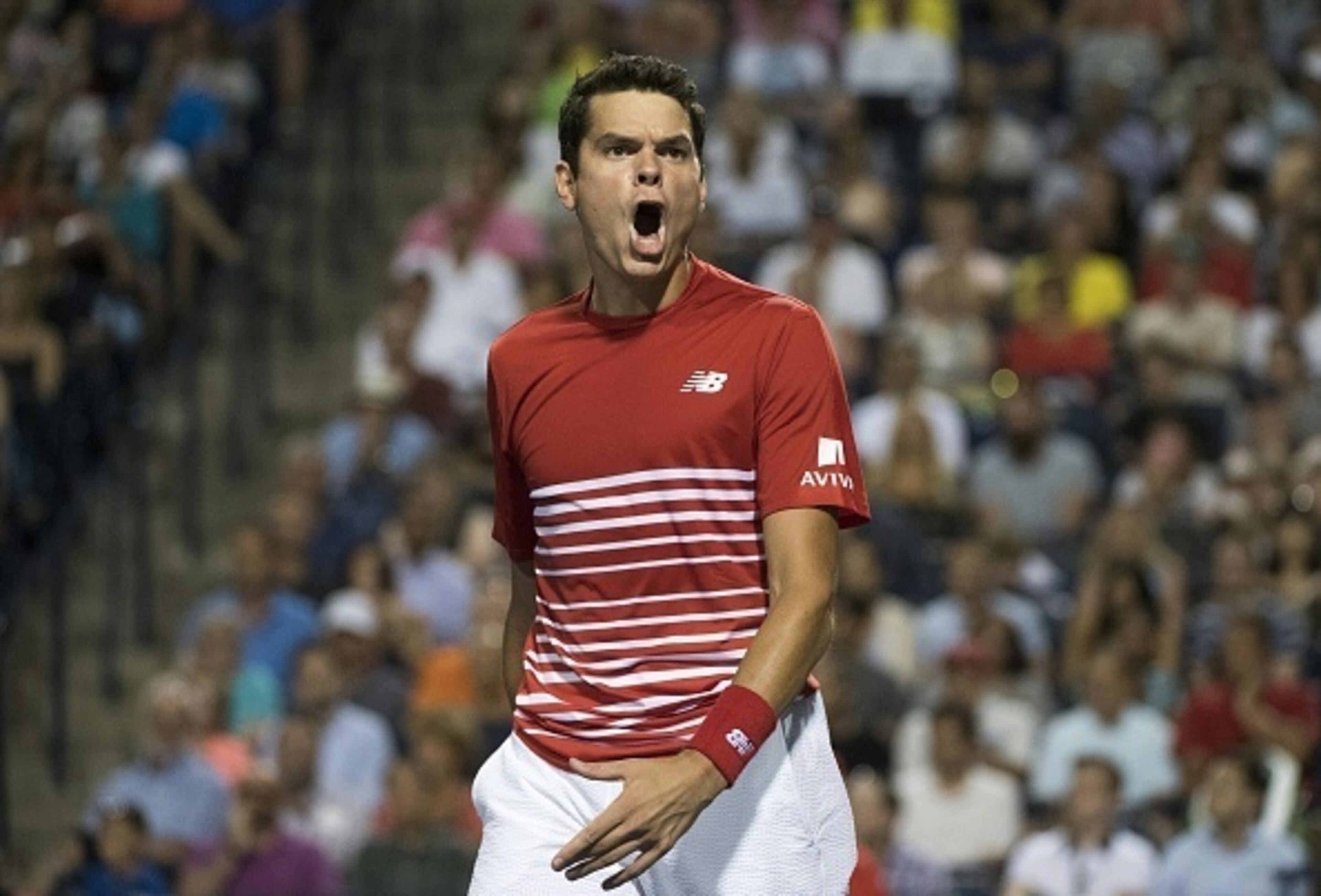 Raonic reacts to a point during the 2016 Rogers Cup.