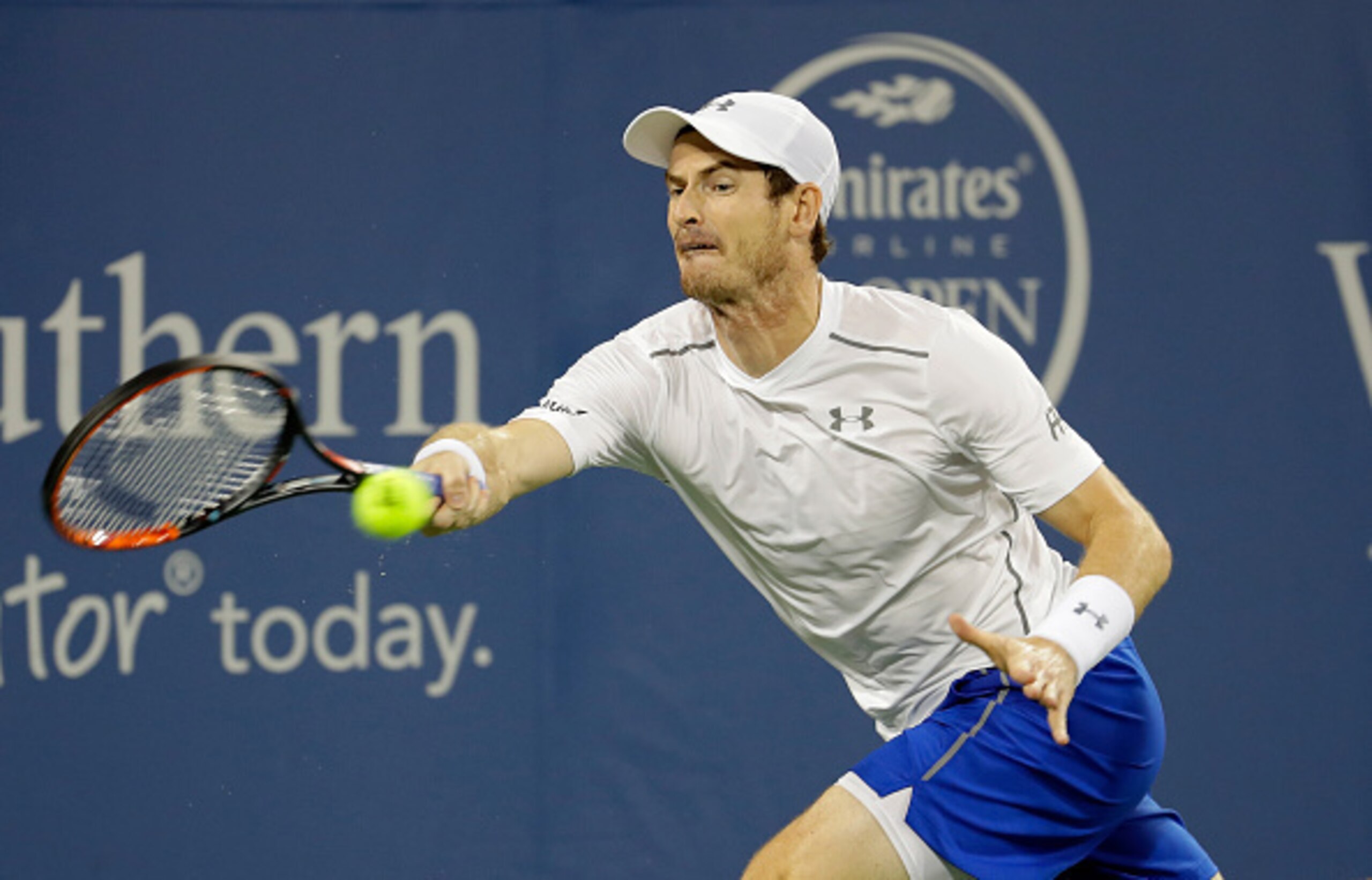 Andy Murray hits a running forehand during a match at the 2016 Western & Southern Open.
