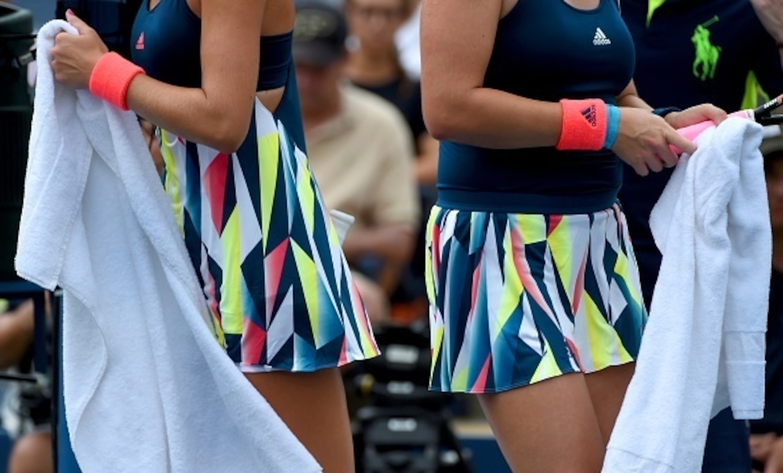 Kristina Mladenovic and Anastasia Pavlyuchenkova wear similar outfits during their match at the 2016 U.S. Open.