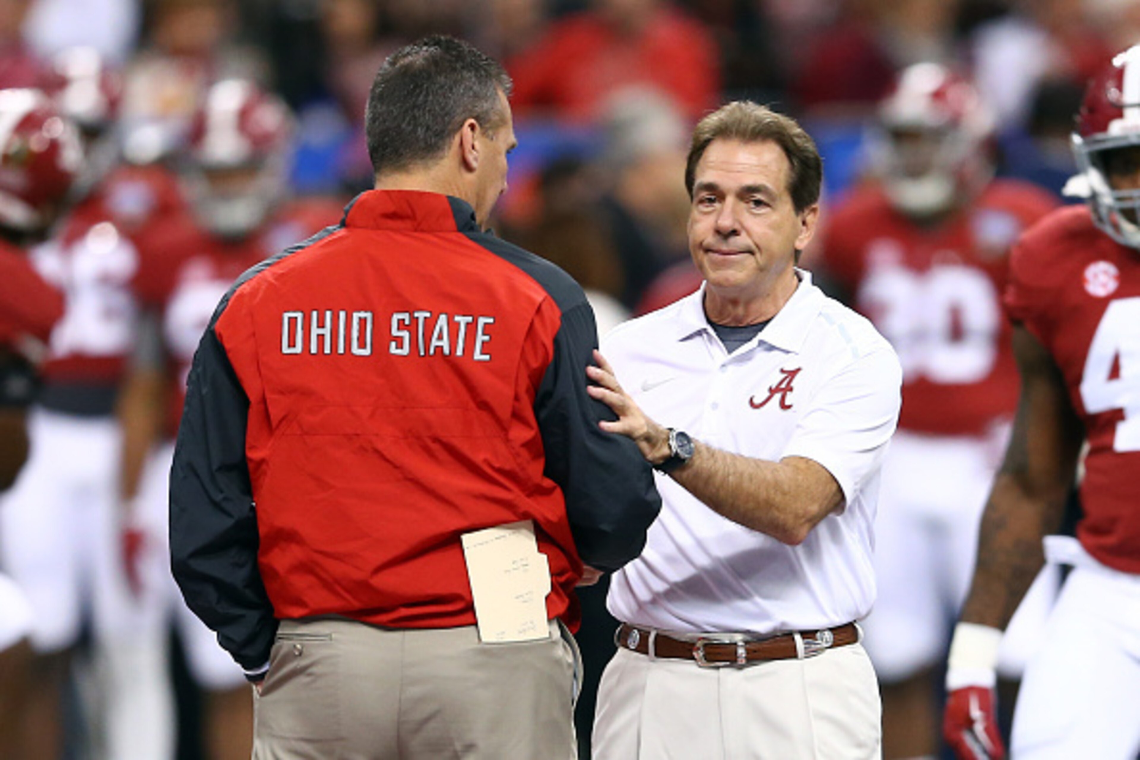 Ohio State head coach Urban Meyer (left) and Alabama head coach Nick Saban (right)