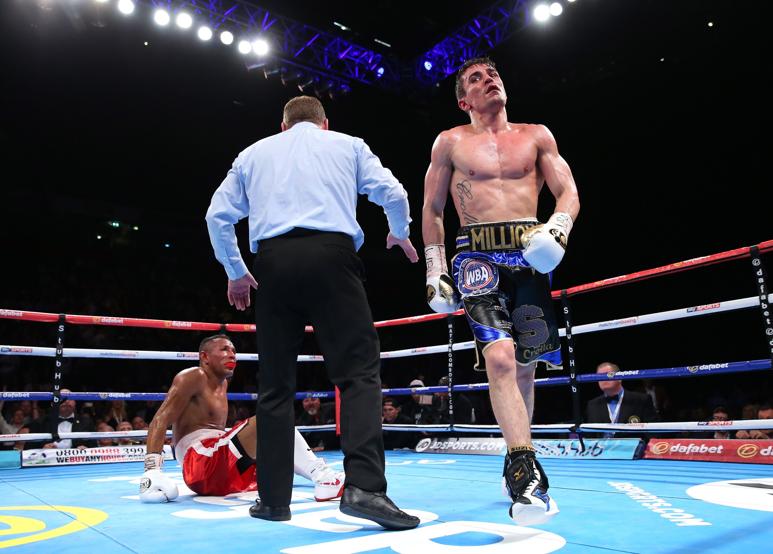 Anthony Crolla stopped Ismael Barroso in his first defence of the WBA title.