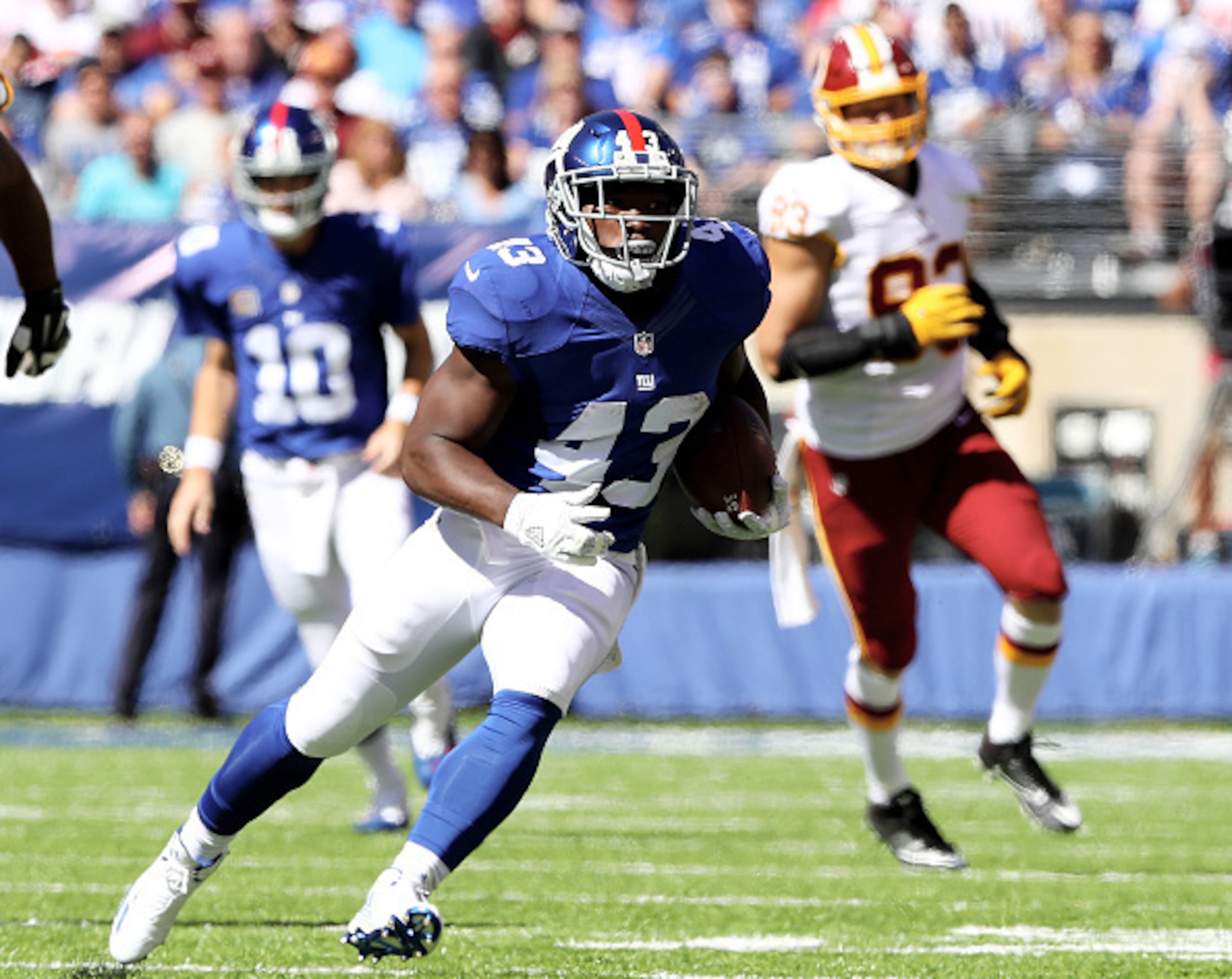 EAST RUTHERFORD, NJ - SEPTEMBER 25: Bobby Rainey #43 of the New York Giants carries the ball in the first quarter against the Washington Redskins at MetLife Stadium on September 25, 2016 in East Rutherford, New Jersey. (Photo by Elsa/Getty Images) EAST RUTHERFORD, NJ - SEPTEMBER 25: Bobby Rainey #43 of the New York Giants carries the ball in the first quarter against the Washington Redskins at MetLife Stadium on September 25, 2016 in East Rutherford, New Jersey. (Photo by Elsa/Getty Images)