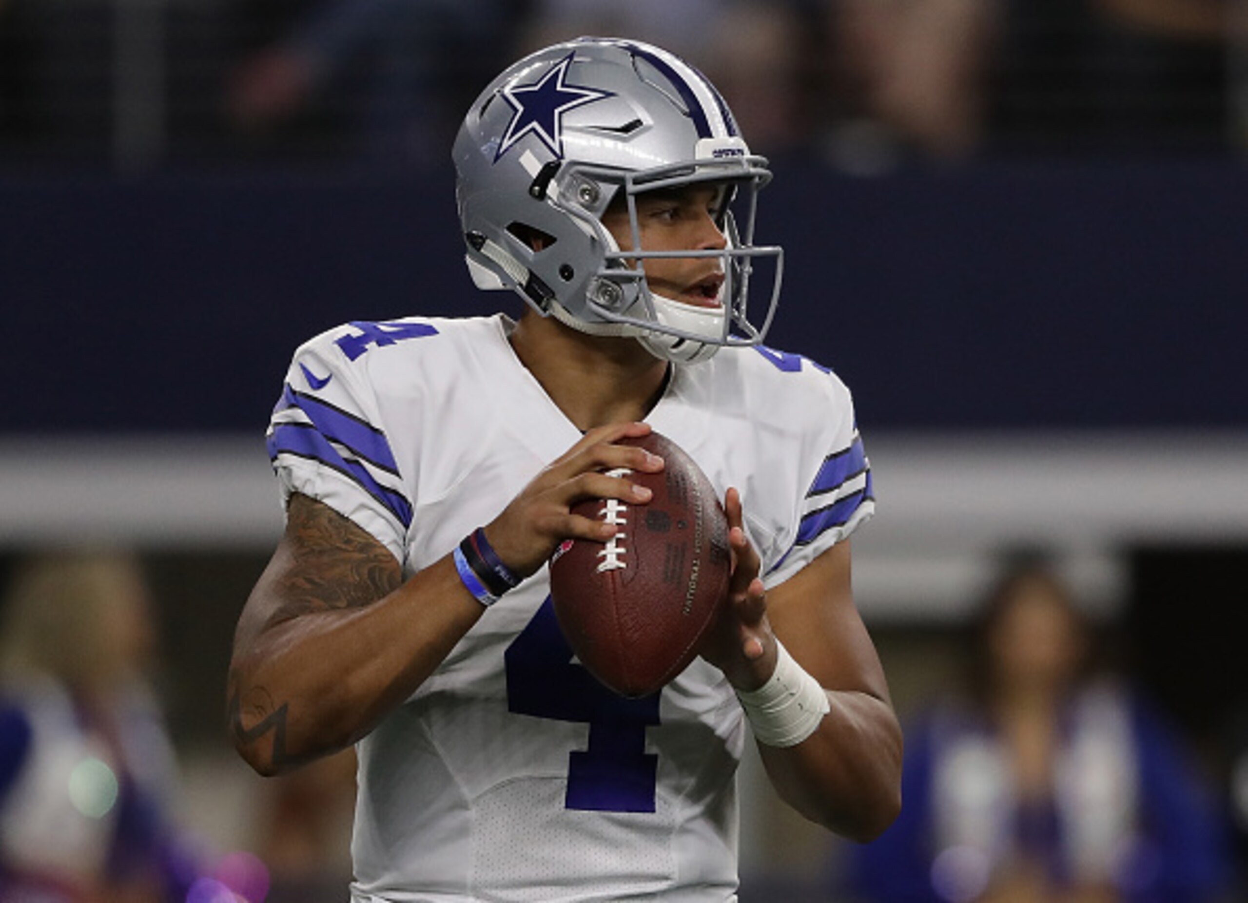 How can the Cowboys justify benching Dak Prescott in favor of Tony Romo?