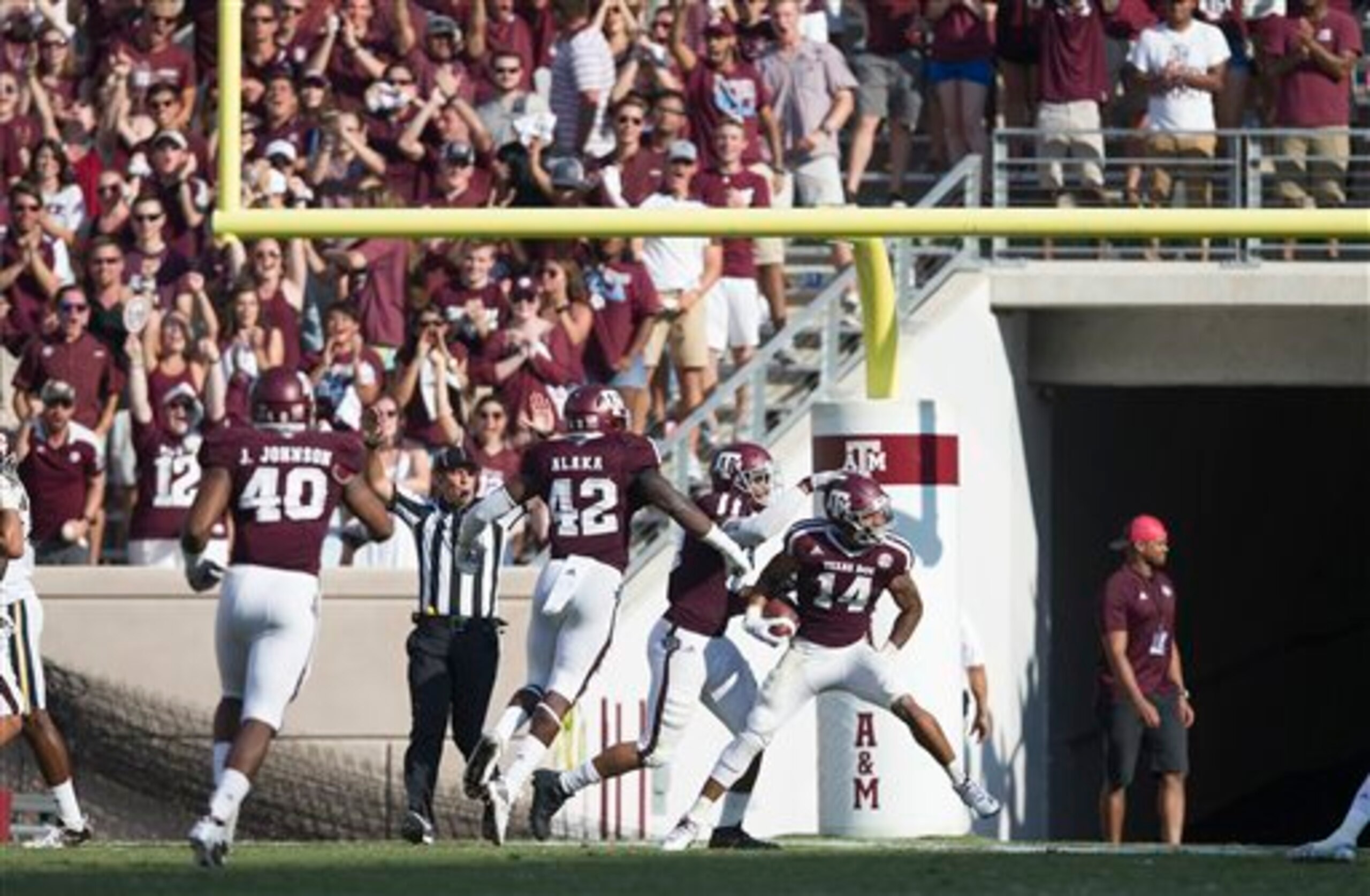 Justin Evans (No. 14).