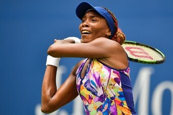 Venus Williams hits a backhand during a fourth-round match at the 2016 U.S. Open.