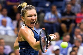 Simona Halep hits a forehand during a quarterfinals match at the 2016 U.S. Open.