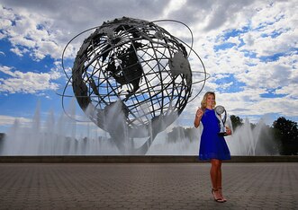 Angelique Kerber holds the new World No. 1 Trophy in Flushing Meadows.