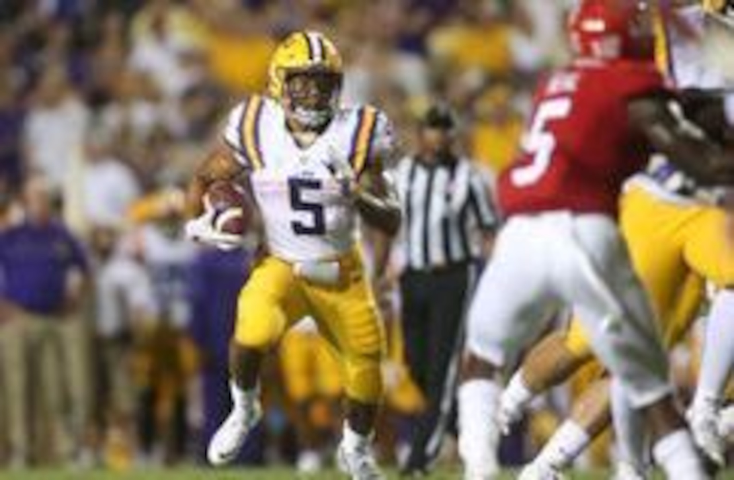 Sep 10, 2016; Baton Rouge, LA, USA;  LSU Tigers running back Derrius Guice (5) carries the ball against the Jacksonville State Gamecocks in the second quarter at Tiger Stadium. Mandatory Credit: Crystal LoGiudice-USA TODAY Sports