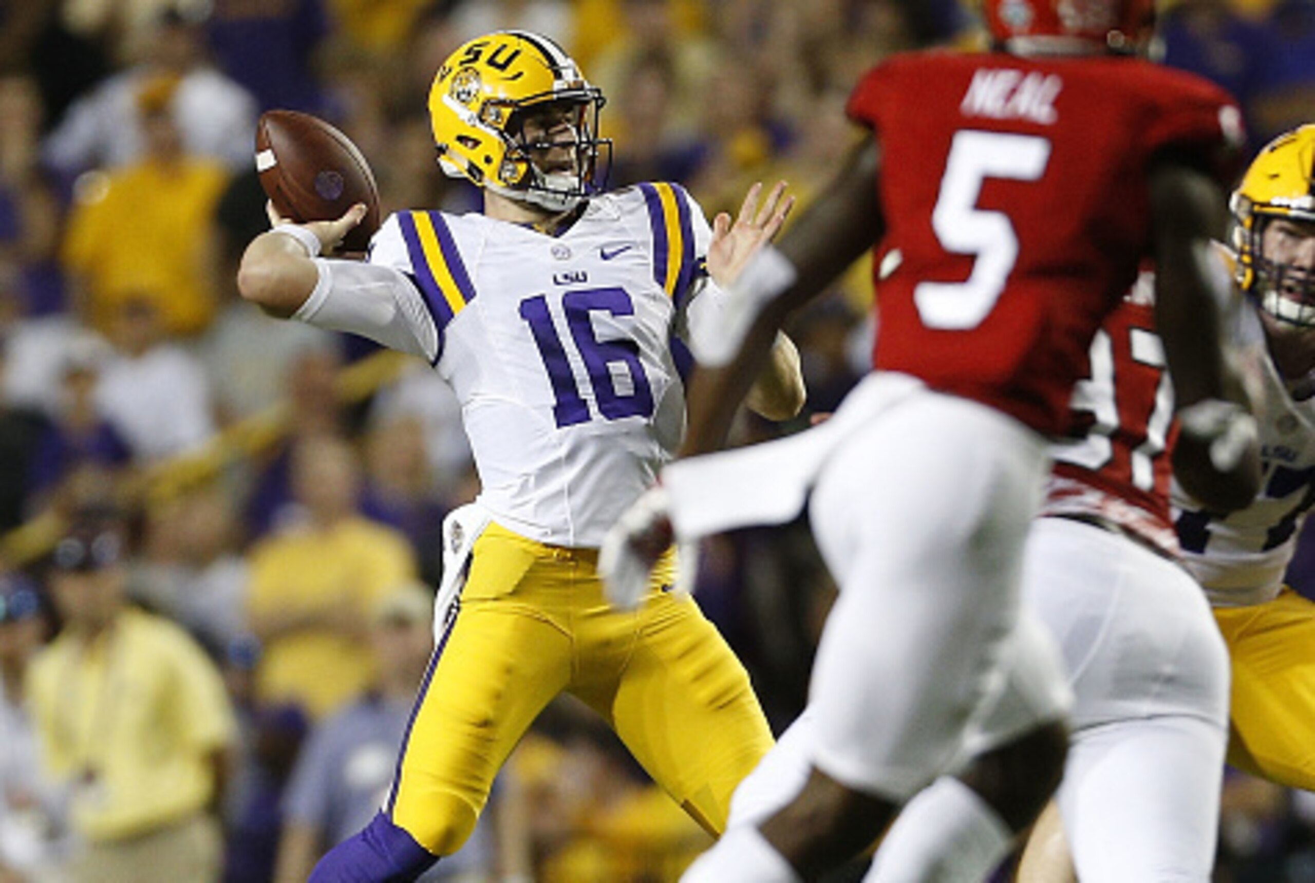 BATON ROUGE, LA - SEPTEMBER 10: Danny Etling #16 of the LSU Tigers throws for a 46-yard touchdown during the first half of a game against the Jacksonville State Gamecocks at Tiger Stadium on September 10, 2016 in Baton Rouge, Louisiana.  (Photo by Jonatha