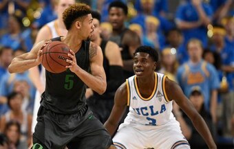 Oregon's Tyler Dorsey (5) and UCLA's Aaron Holiday (3)