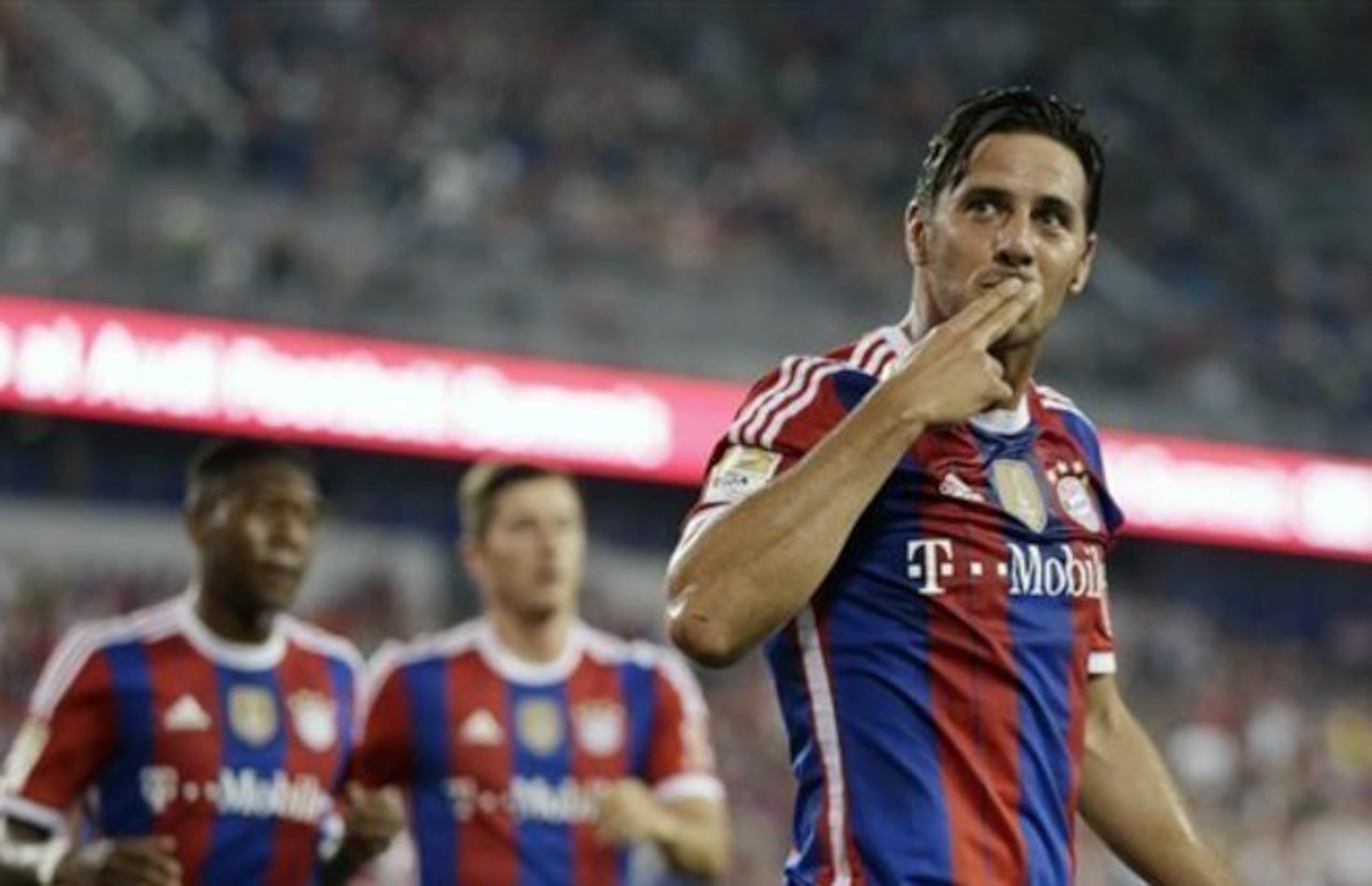 Pizarro (r.) overtook Elber as the top scoring foreign-born player in Bundesliga history in 2010.