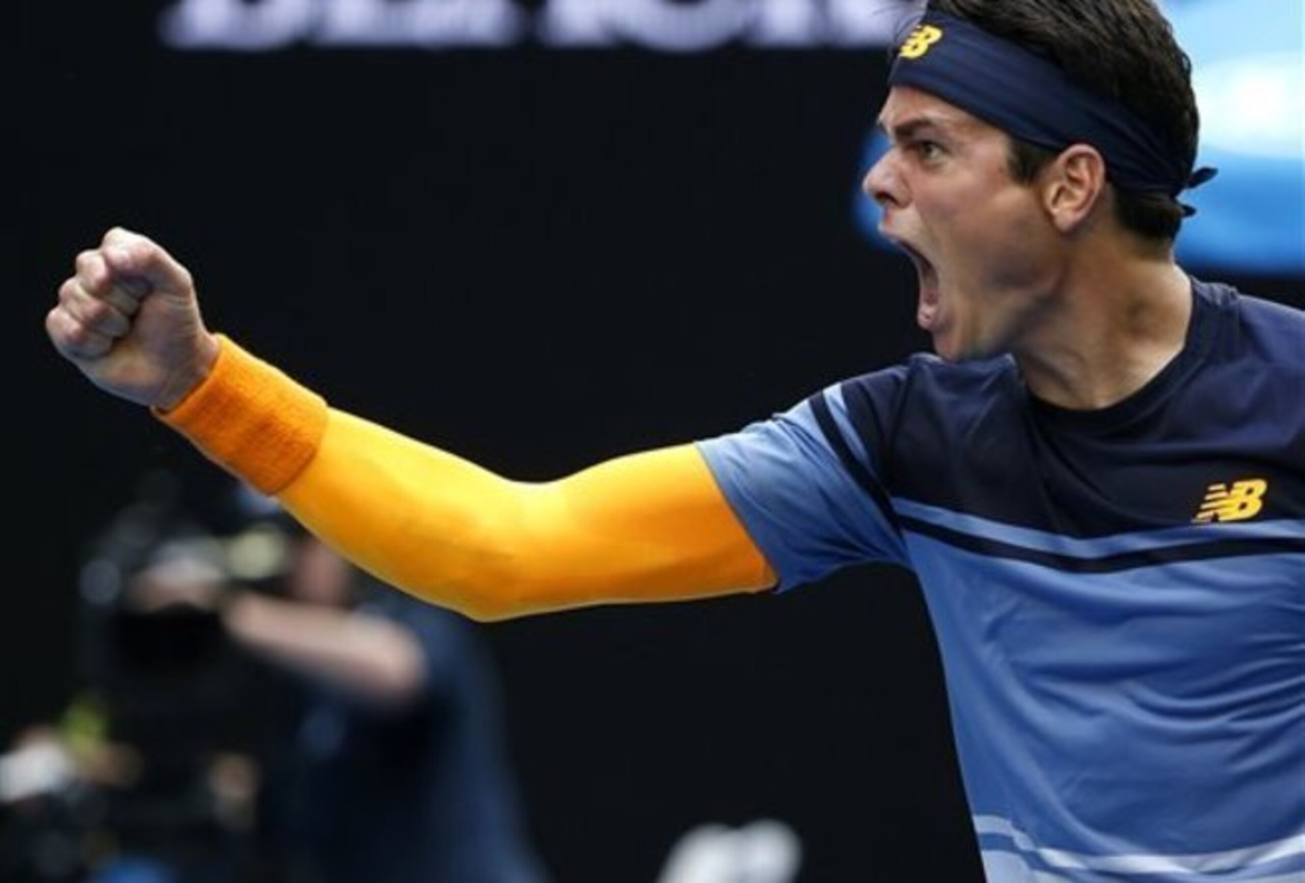 Milos Raonic celebrates during a 2016 Australian Open match.