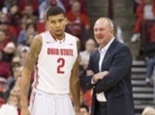 Marc Loving (2) and Thad Matta