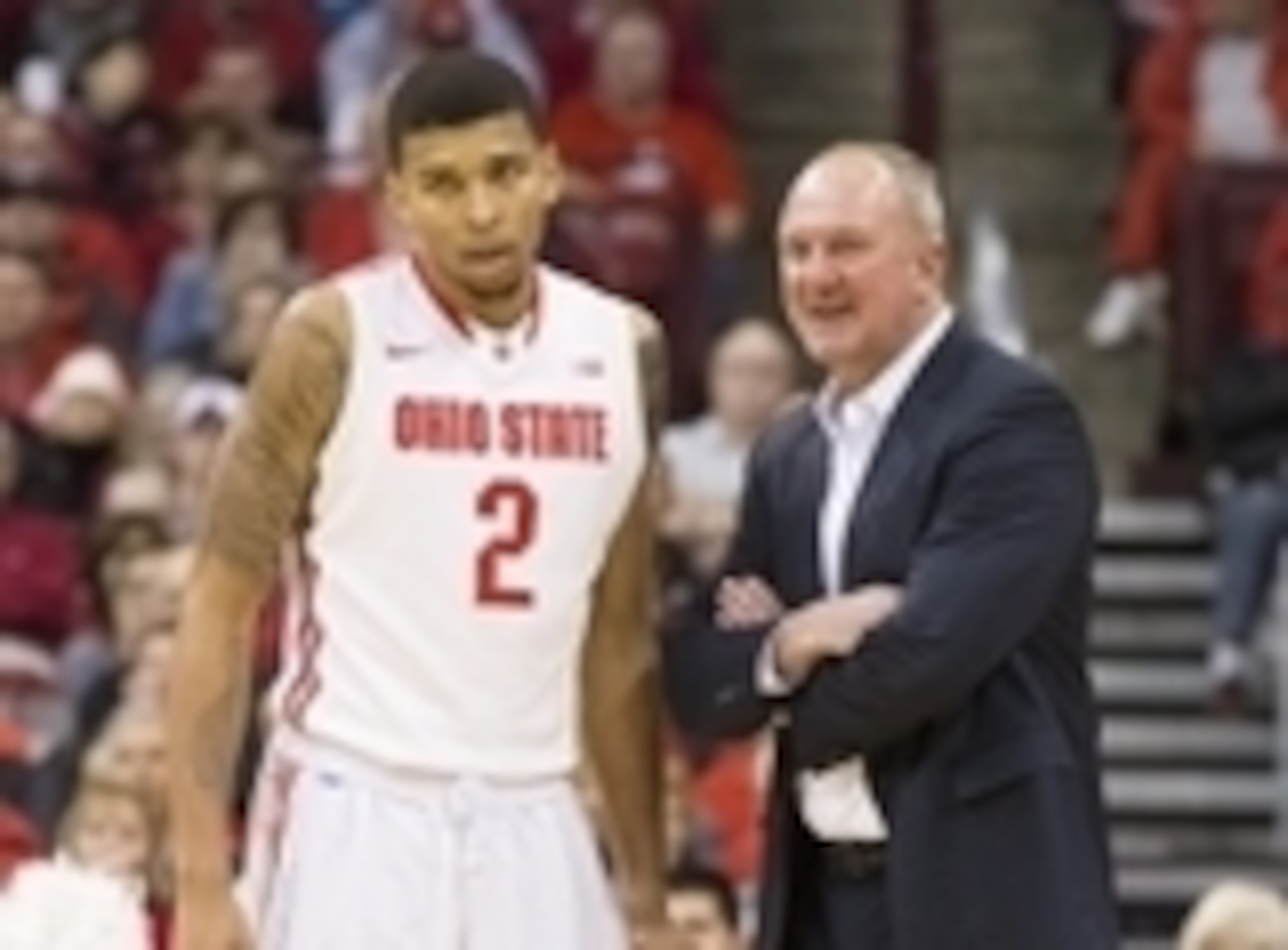 Marc Loving (2) and Thad Matta