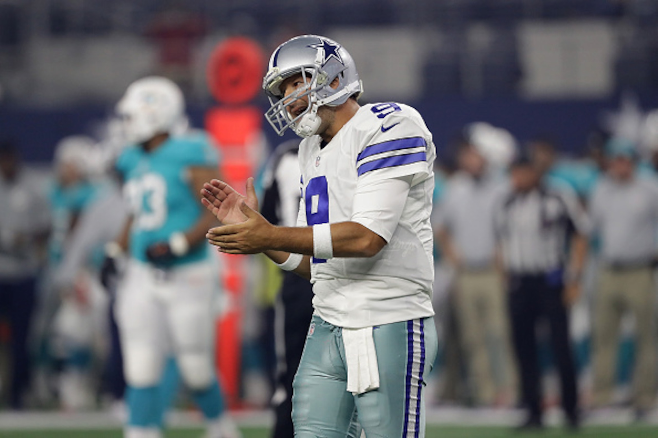 The public believes Tony Romo's job is in jeopardy after the Dallas Cowboys improved to 2-12 without him since 2015.