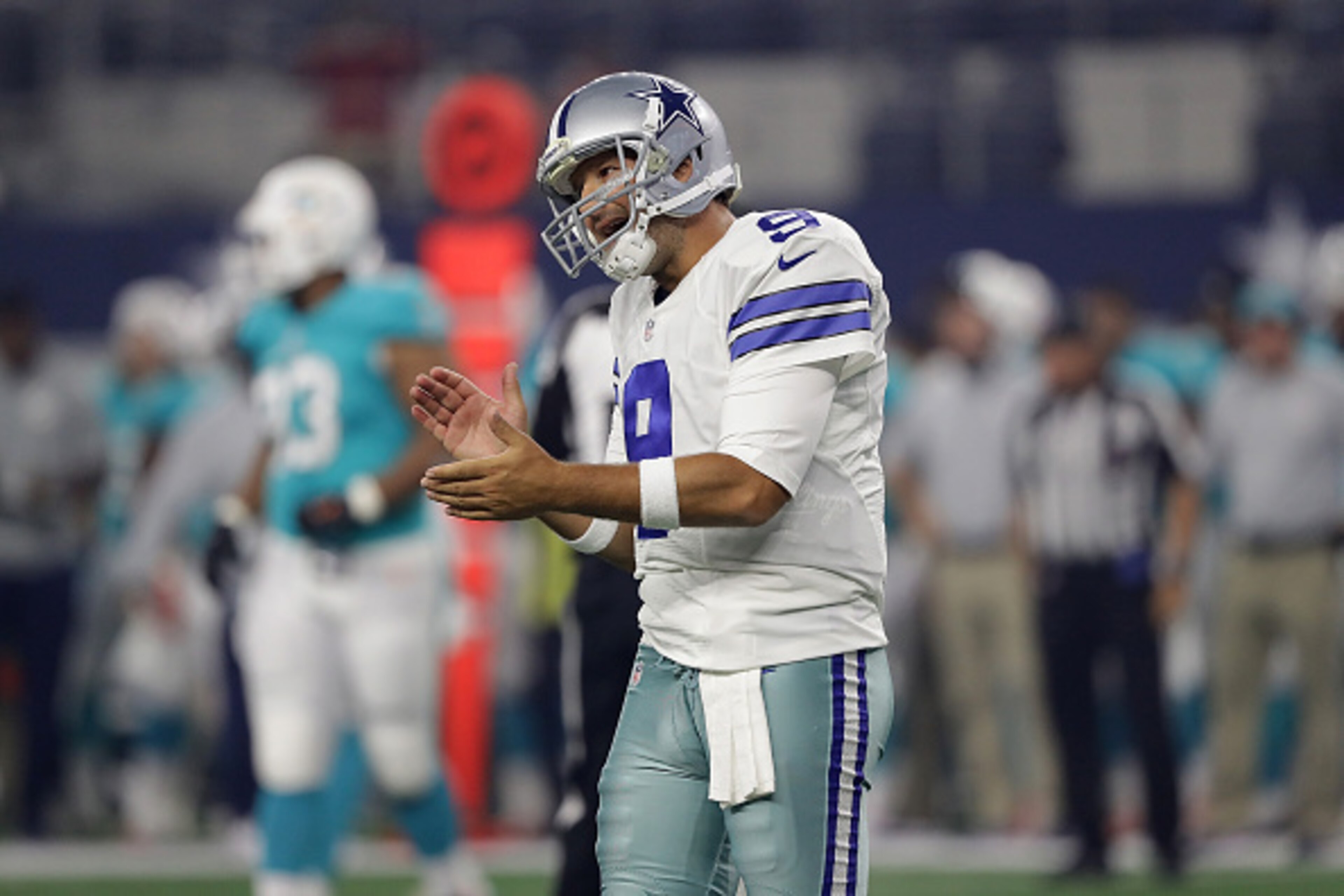 The public believes Tony Romo's job is in jeopardy after the Dallas Cowboys improved to 2-12 without him since 2015.