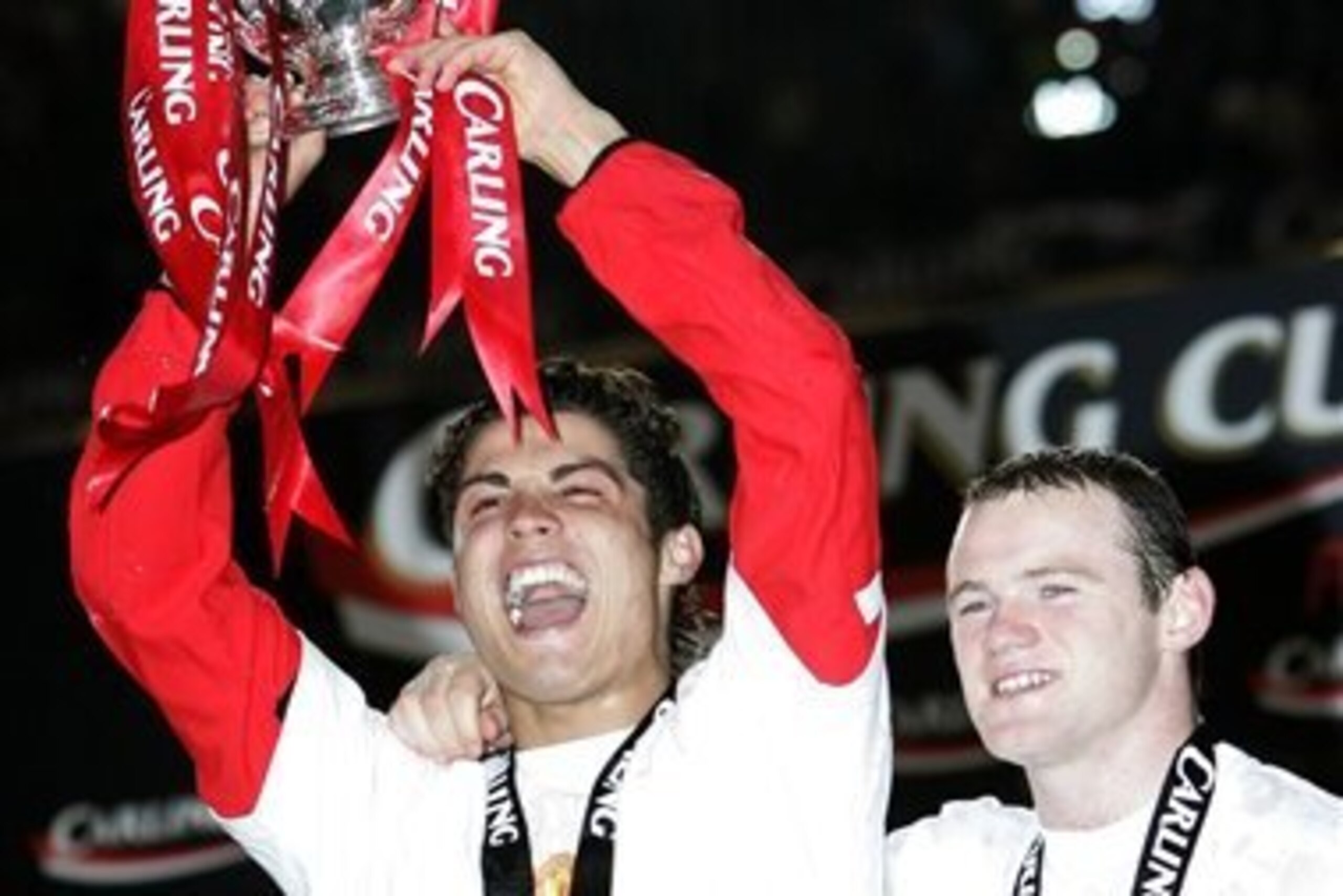 A very young Cristiano Ronaldo and Wayne Rooney celebrate their first League Cup win.