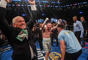 Carl Frampton and his team celebrate his win over Leo Santa Cruz.