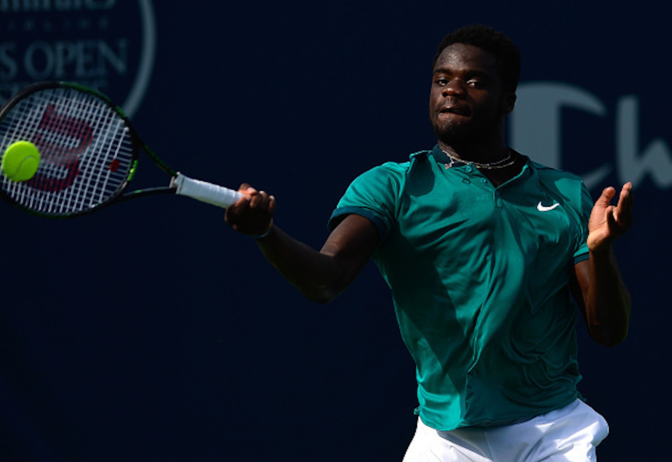 Frances Tiafoe hits a forehand during a match at the 2016 Winston-Salem Open.