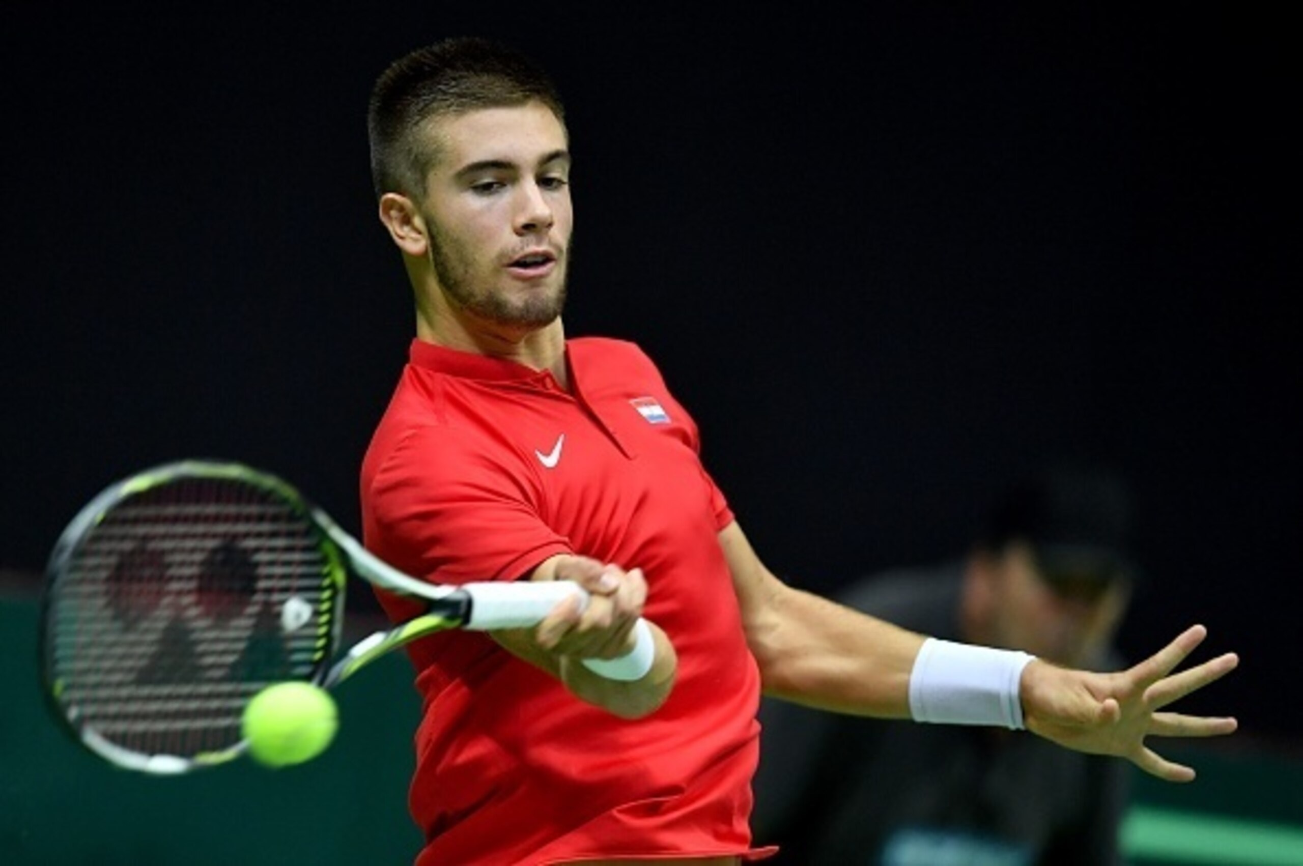 Borna Coric hits a forehand during a 2016 Davis Cup tie against France.