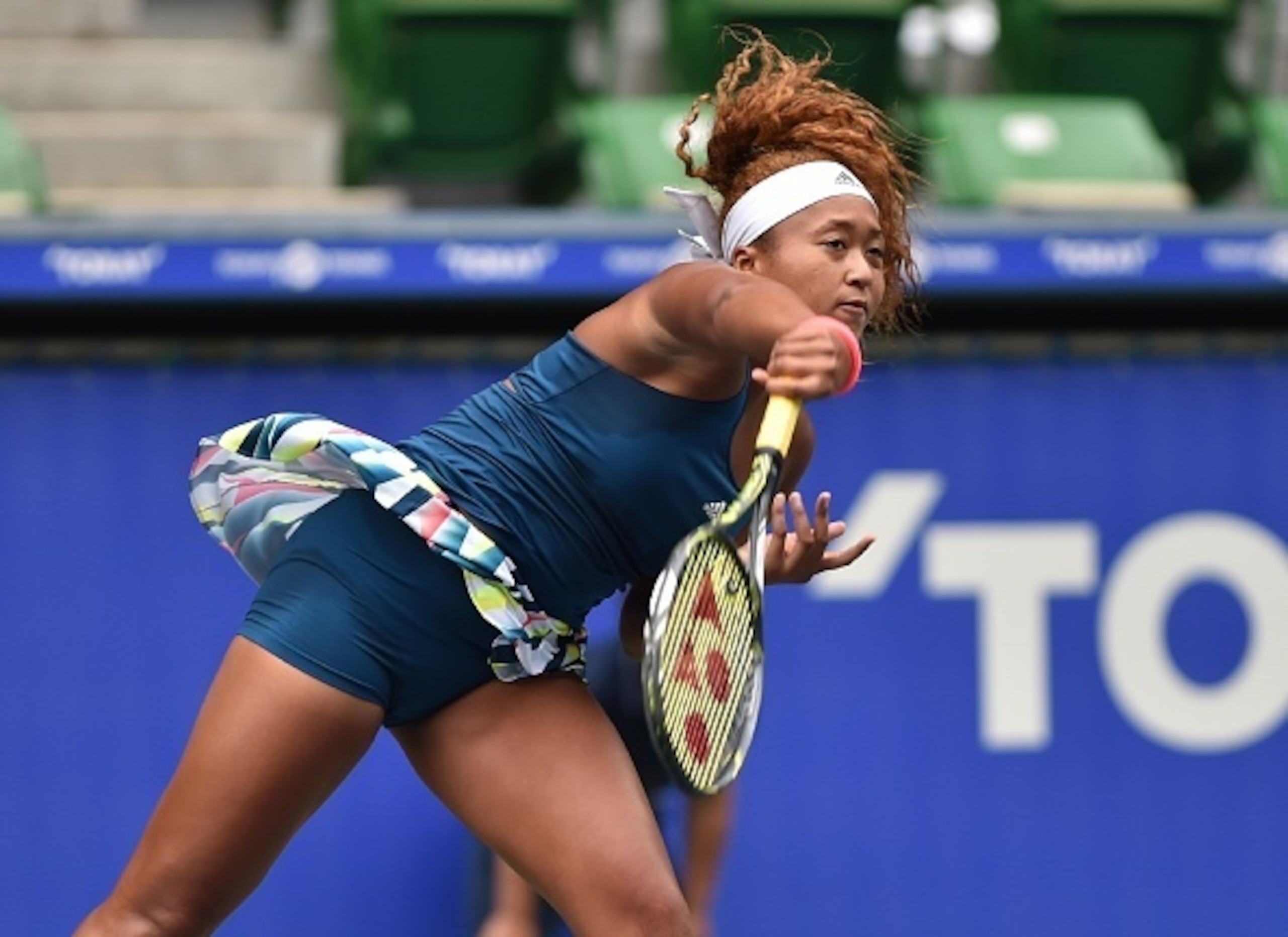 Naomi Osaka hits a forehand during a match at the 2016 U.S. Open.