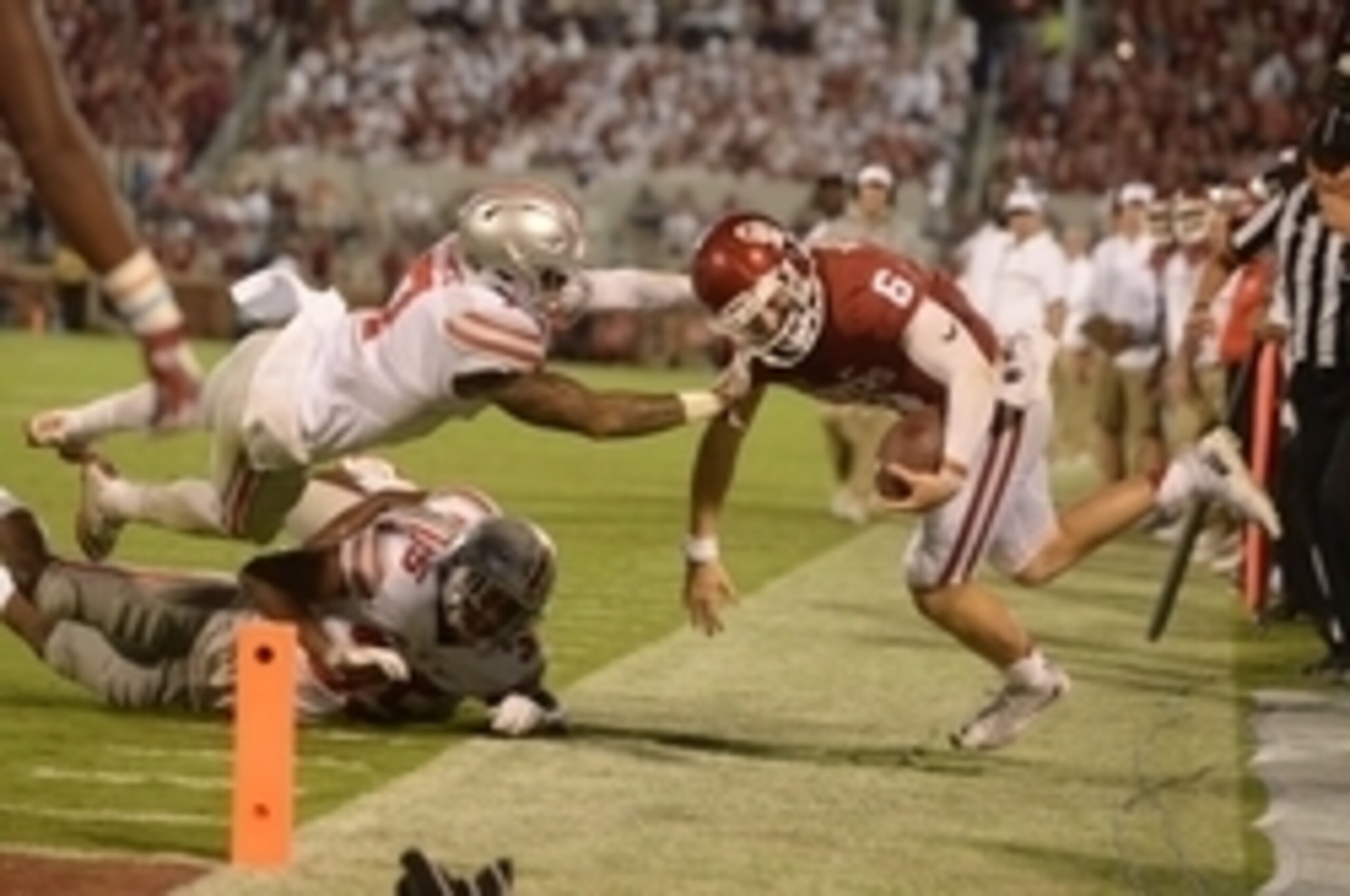 Sep 17, 2016; Norman, OK, USA; Oklahoma Sooners quarterback Baker Mayfield (6) is hit by Ohio State Buckeyes cornerback Damon Webb (7) in the fourth quarter at Gaylord Family - Oklahoma Memorial Stadium. Mandatory Credit: Mark D. Smith-USA TODAY Sports