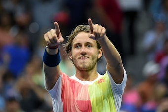 Pouille celebrates after reaching the quarterfinals at the U.S. Open.
