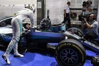 Lewis Hamilton congratulates Nico Rosberg after the Singapore Grand Prix.