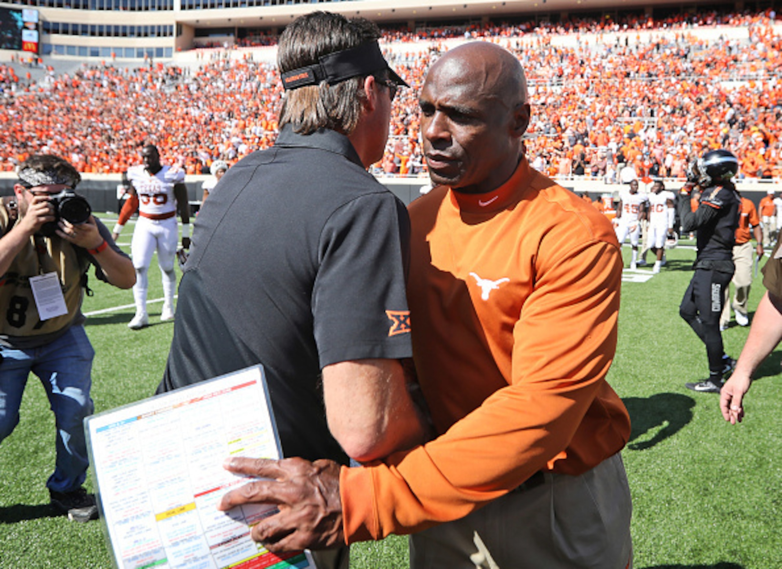 Texas coach Charlie Strong is making more changes on his staff following an ugly start.