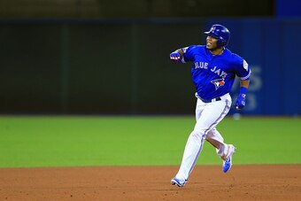 Edwin Encarnacion took his invisible parrot for a spin around the bases after hitting a walk-off homer in Tuesday's AL Wild Card Game.