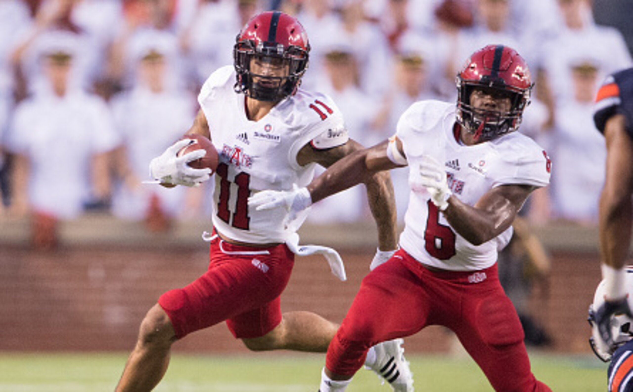 Arkansas State's Cameron Echols-Luper (11) and Warren Wand (6) Arkansas State's Cameron Echols-Luper (11) and Warren Wand (6)