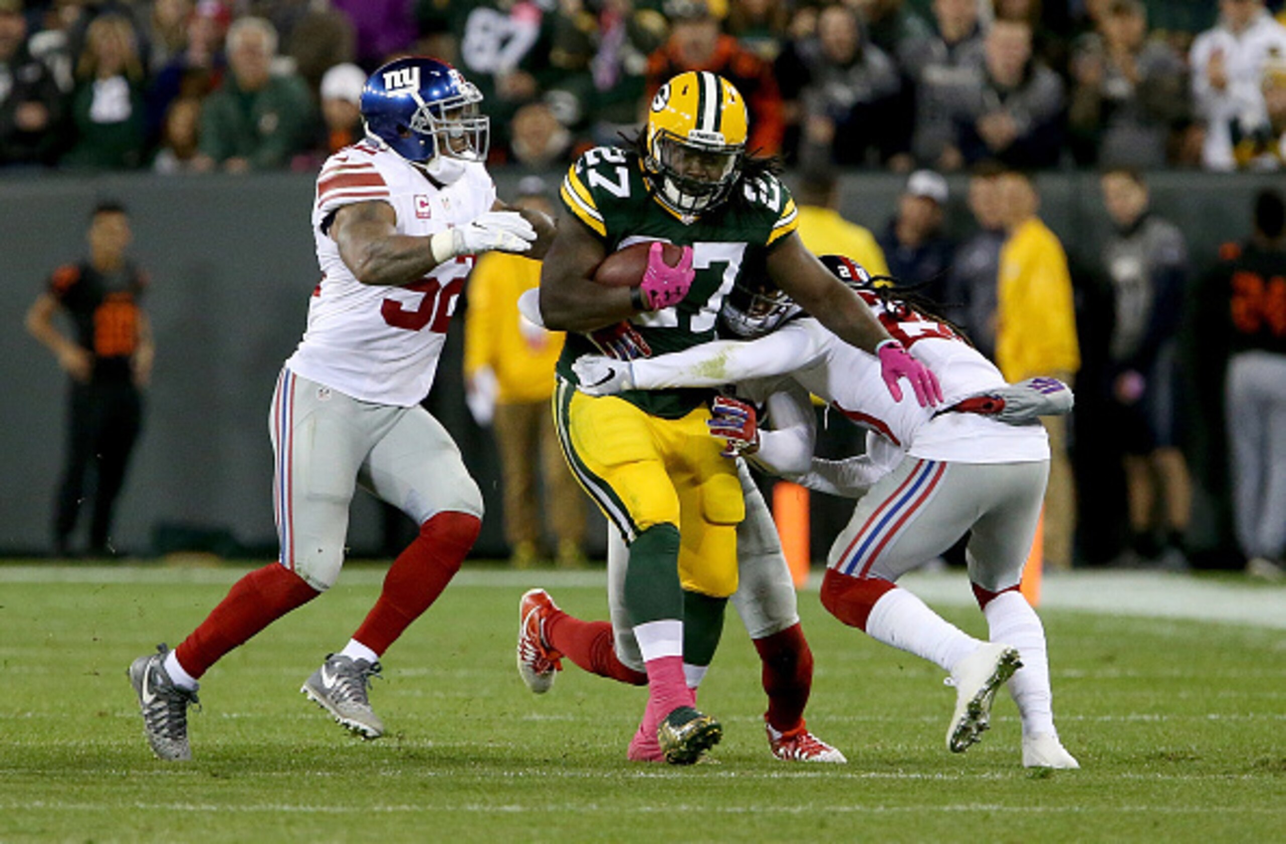 GREEN BAY, WI - OCTOBER 09:  Eddie Lacy #27 of the Green Bay Packers is tackled by Janoris Jenkins #20 of the New York Giants in the second quarter at Lambeau Field on October 9, 2016 in Green Bay, Wisconsin. (Photo by Dylan Buell/Getty Images)
