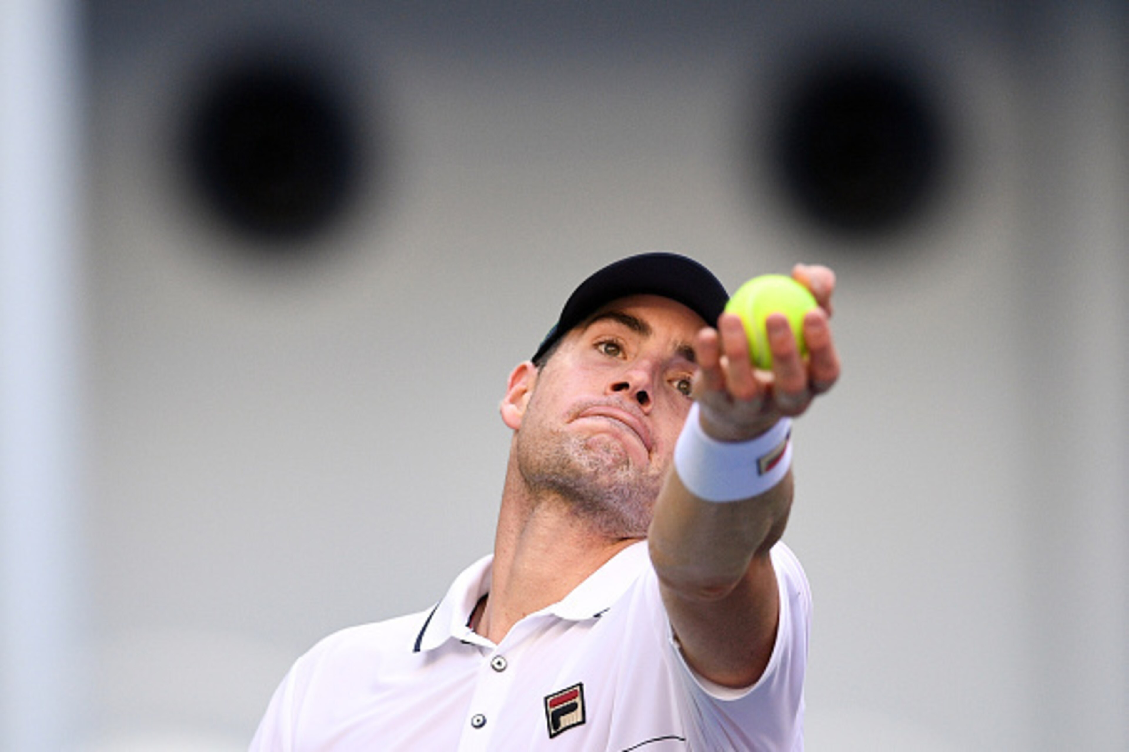 John Isner prepares to serve during a match at the 2016 China Open. John Isner prepares to serve during a match at the 2016 China Open.