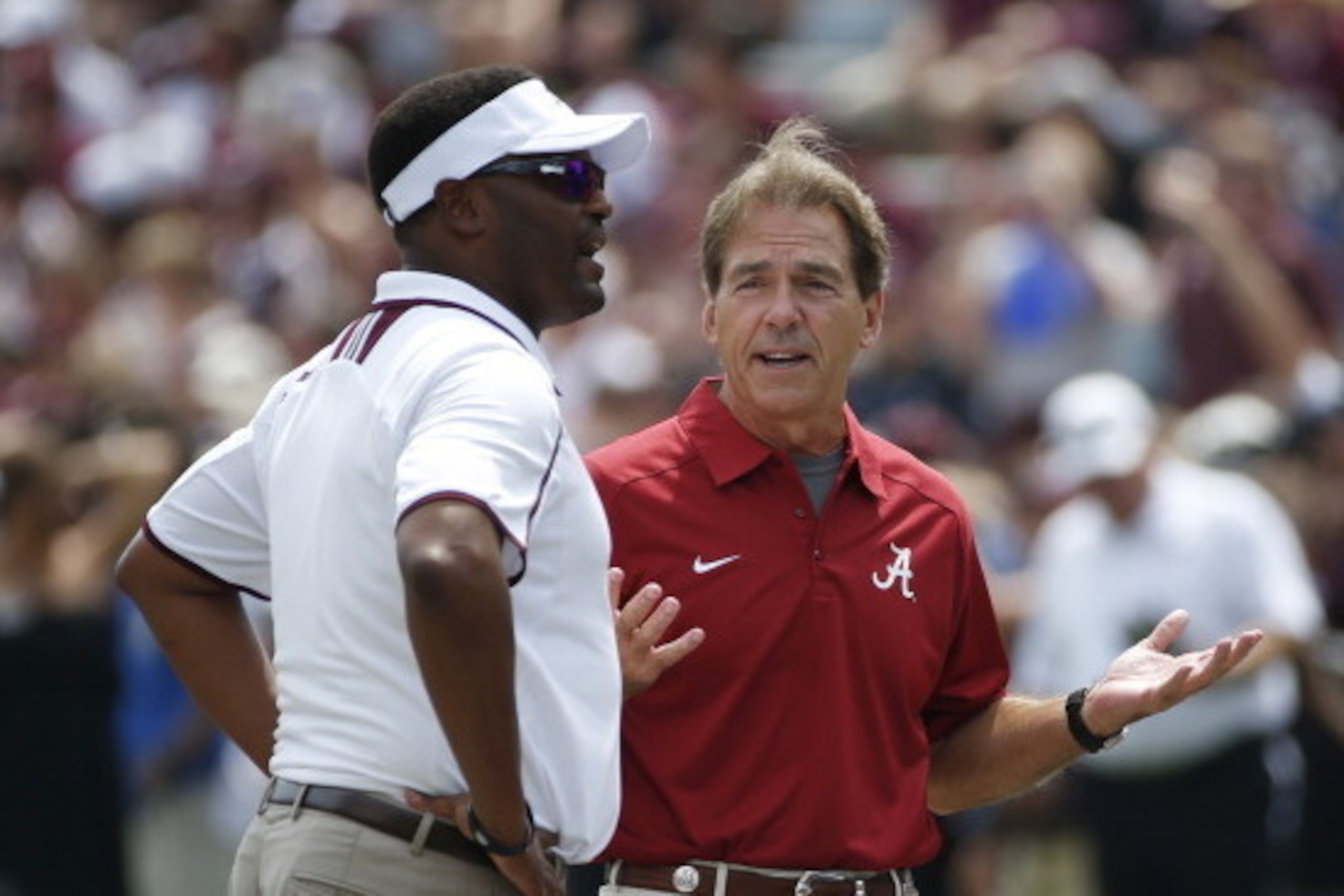 Texas A&M head coach Kevin Sumlin, left, and Alabama head coach Nick Saban claim two of the SEC's top recruiting classes.