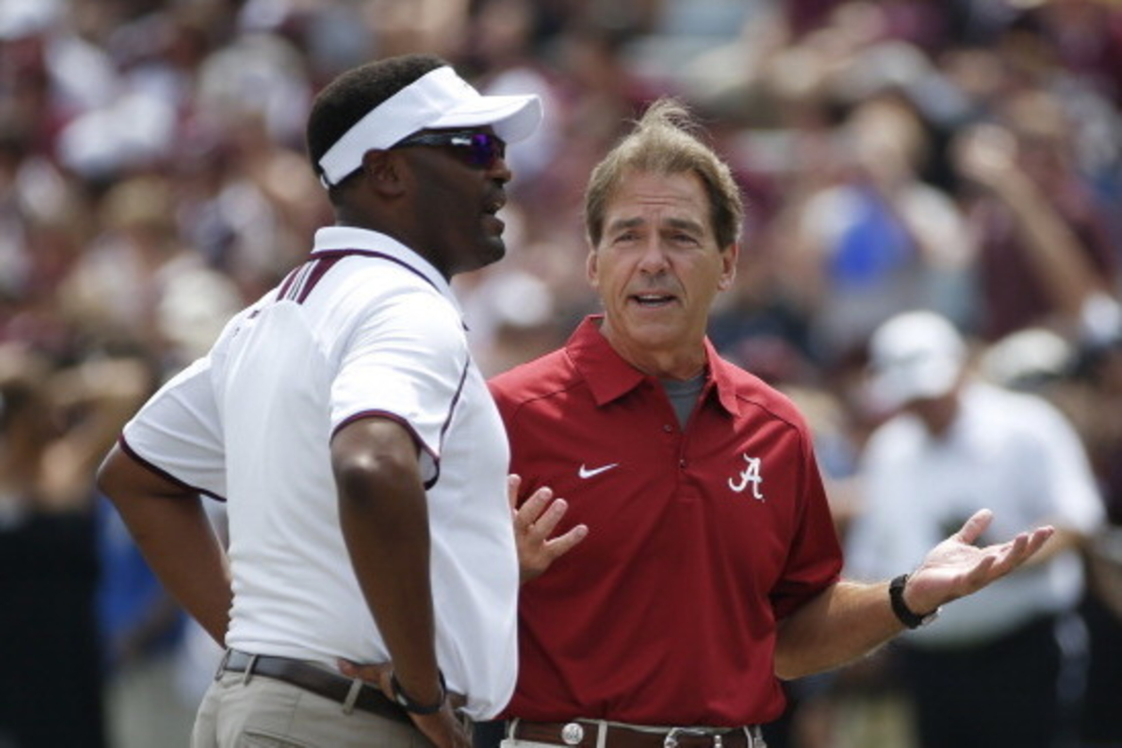 Texas A&M head coach Kevin Sumlin, left, and Alabama head coach Nick Saban claim two of the SEC's top recruiting classes.