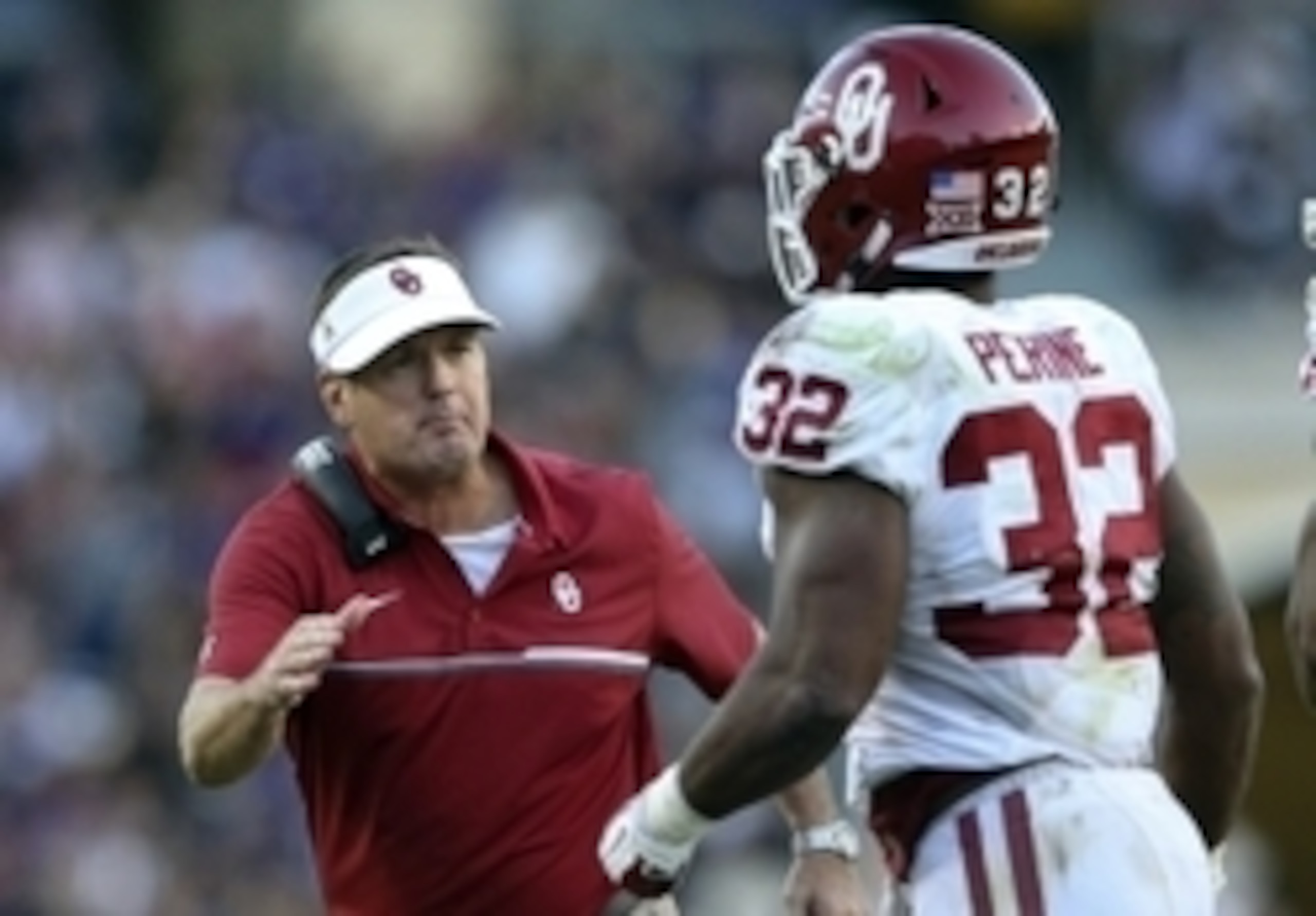 Oklahoma HC Bob Stoops and RB Samaje Perine Oklahoma HC Bob Stoops and RB Samaje Perine