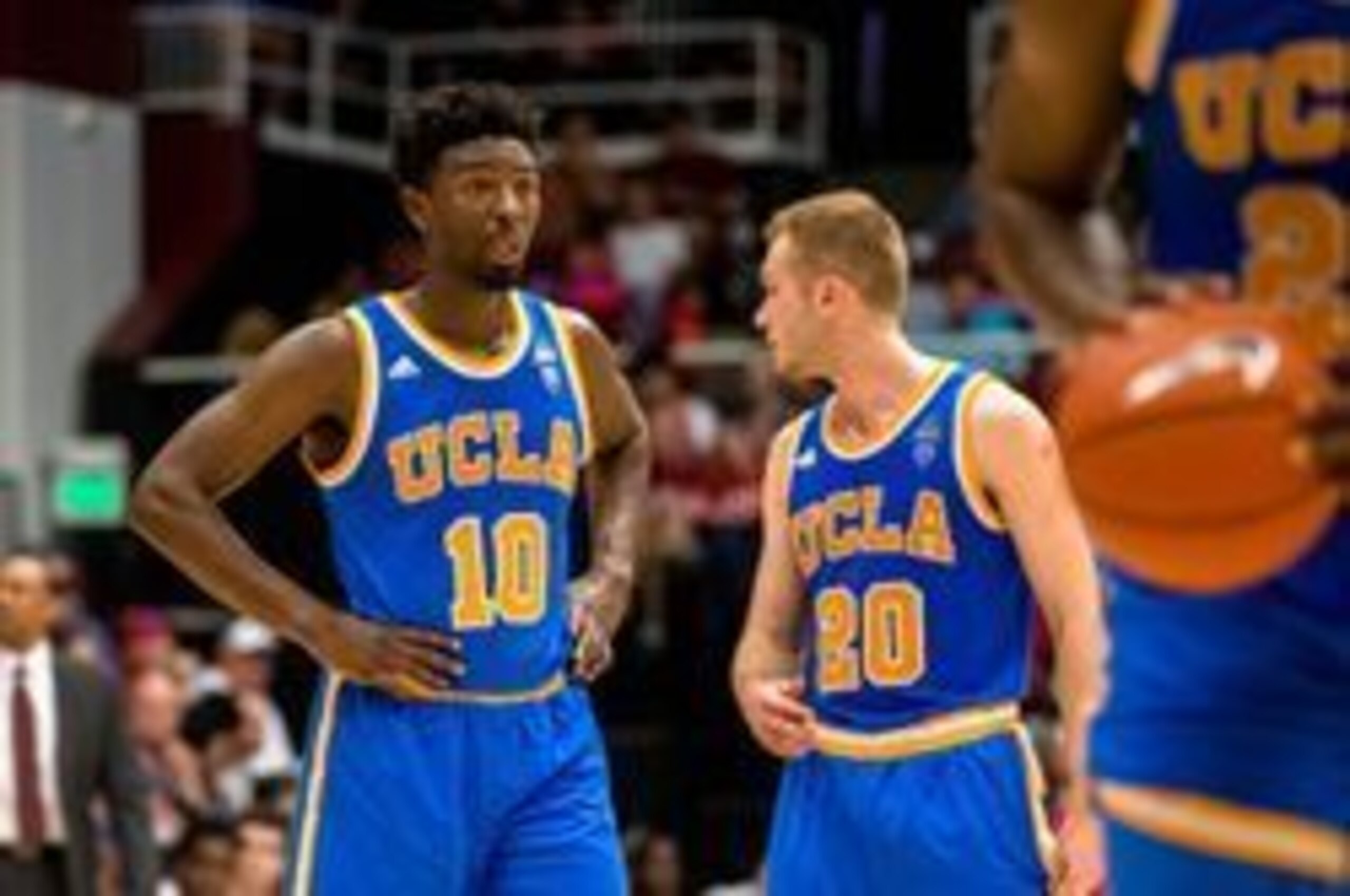 Isaac Hamilton (10) and Bryce Alford (20)