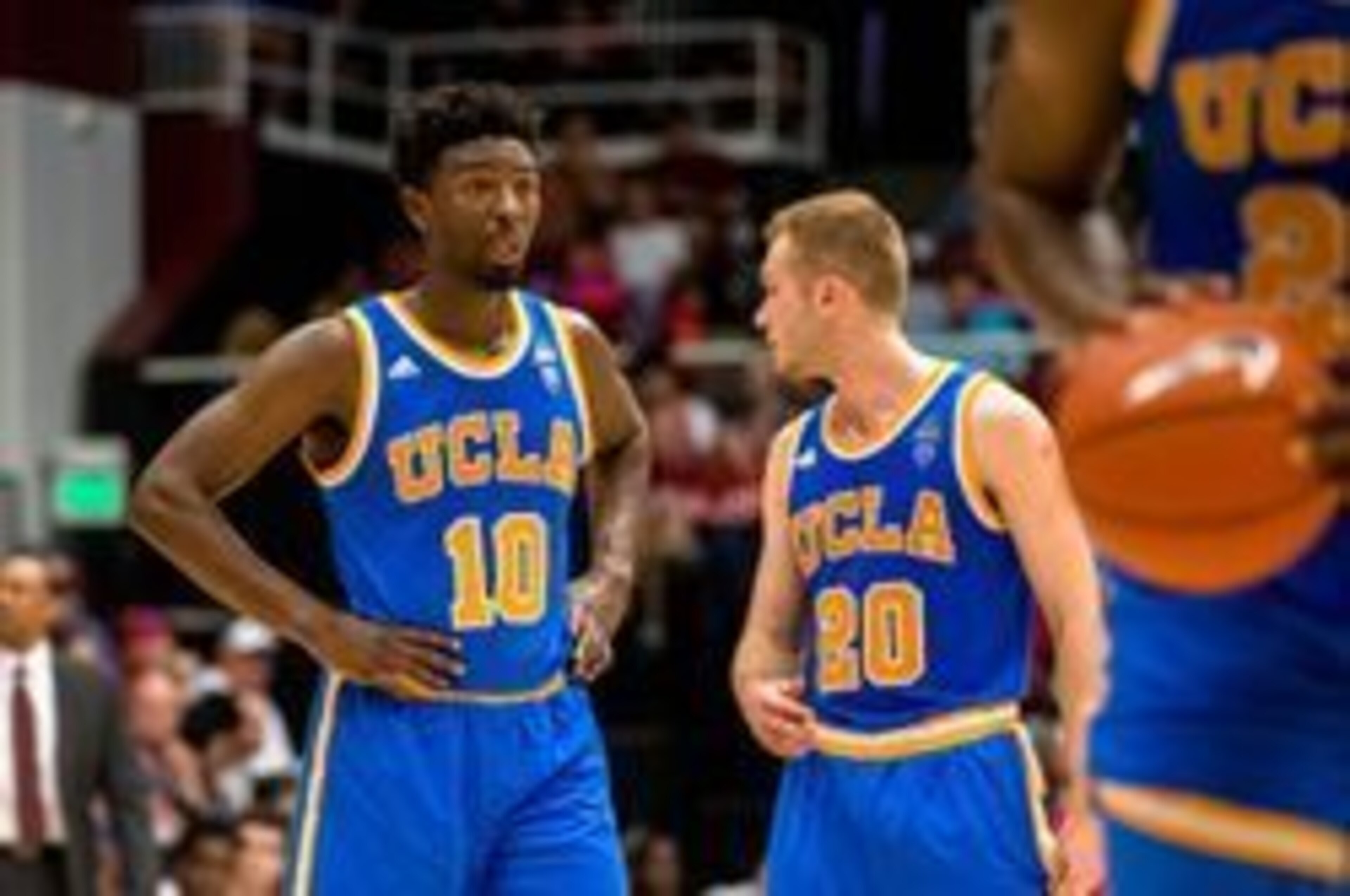 Isaac Hamilton (10) and Bryce Alford (20)