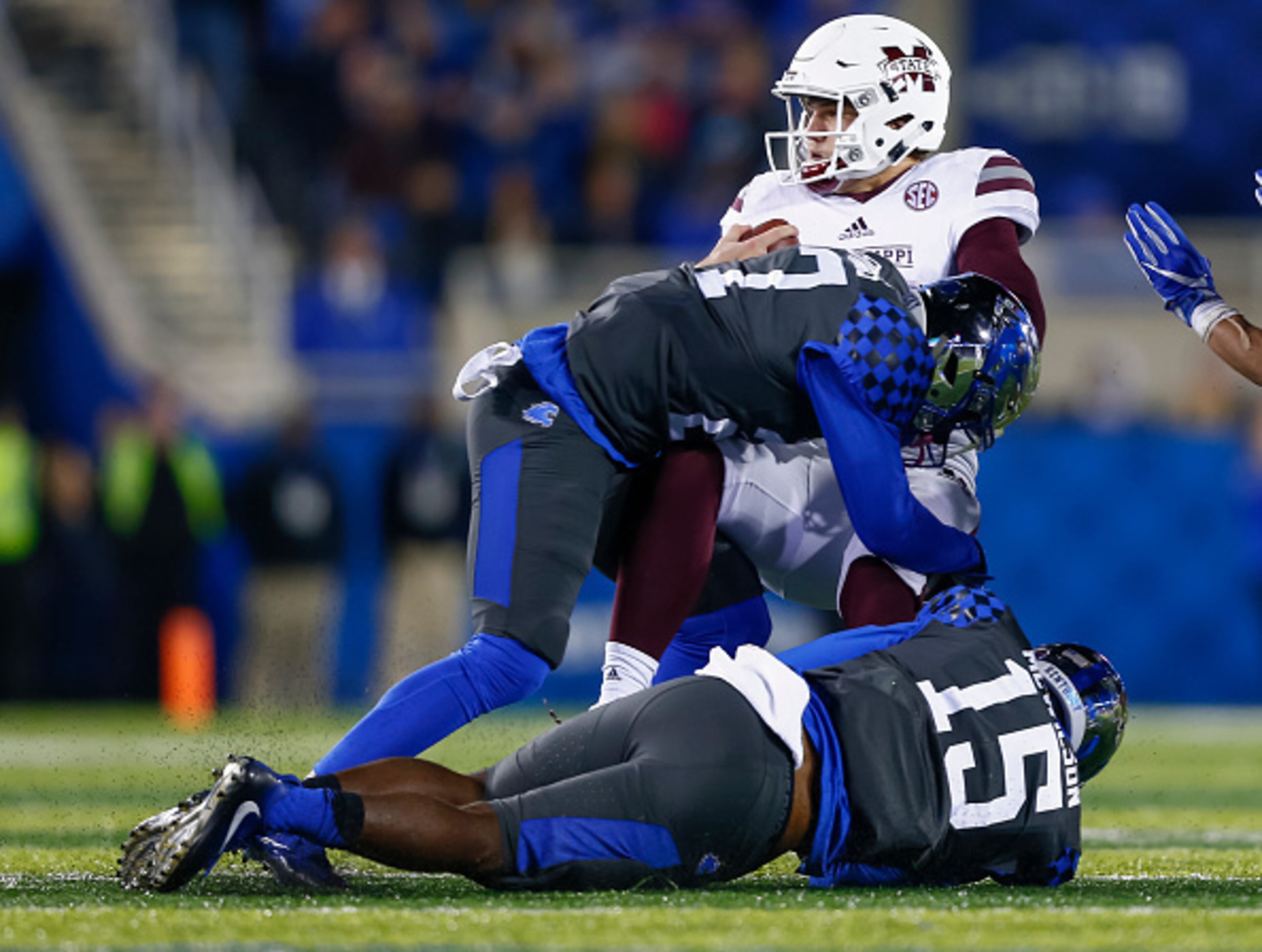 Marcus McWilson (No. 15) gets in on a tackle against Mississippi State.