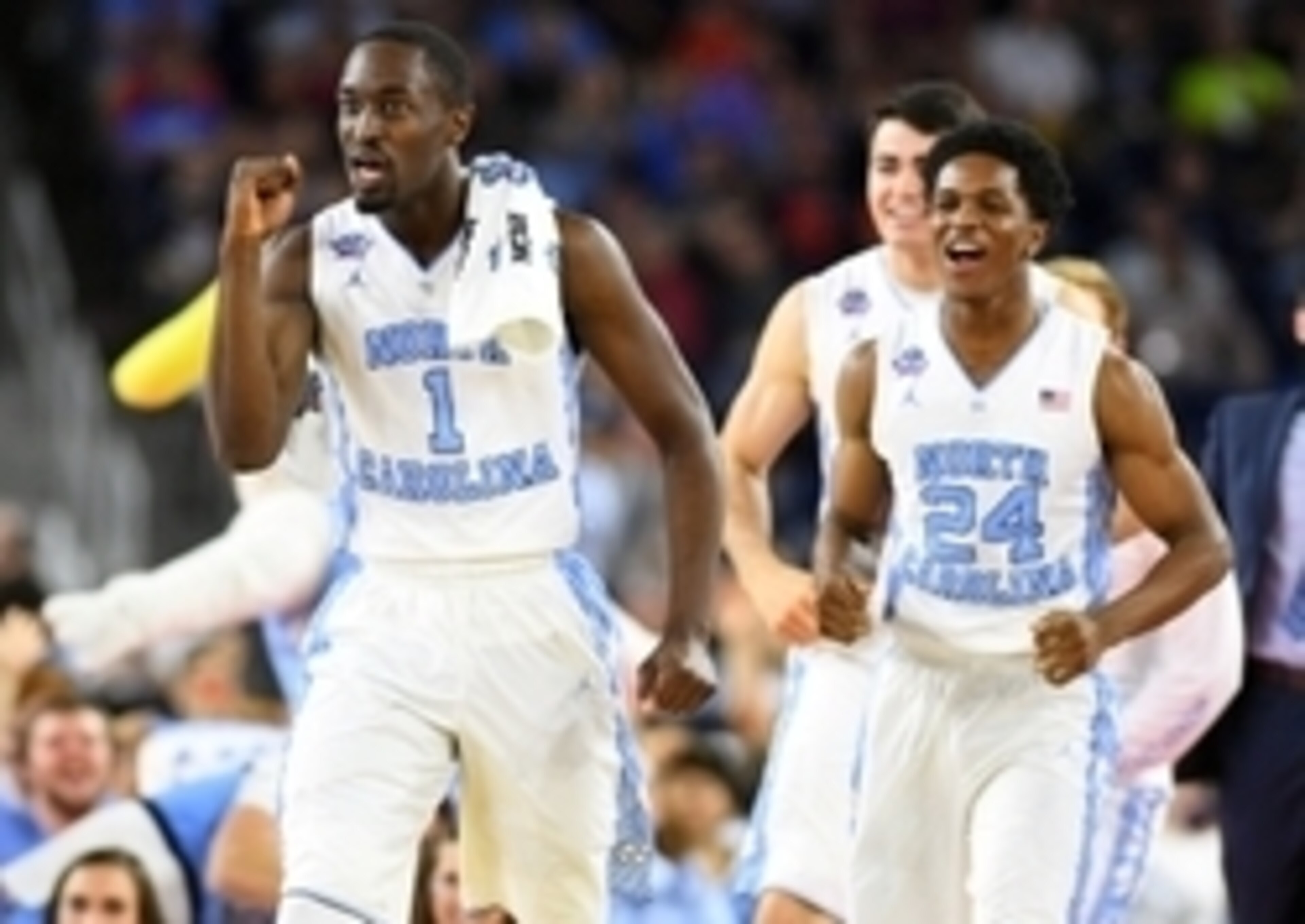 Theo Pinson (1) and Kenny Williams (24)